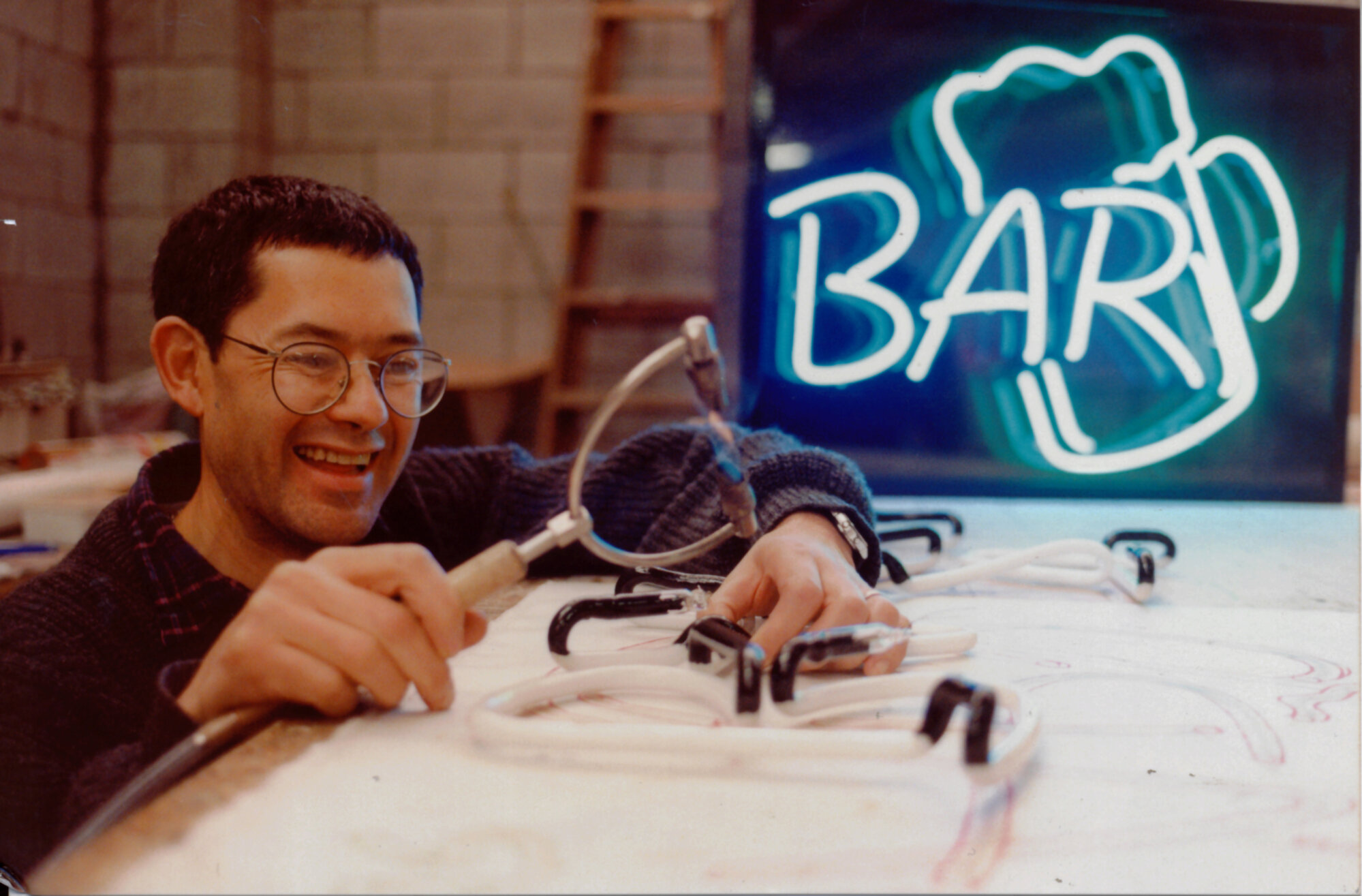 Neon 3, 23 Montgomery Crescent; managing director Peter Chang bending tubing.