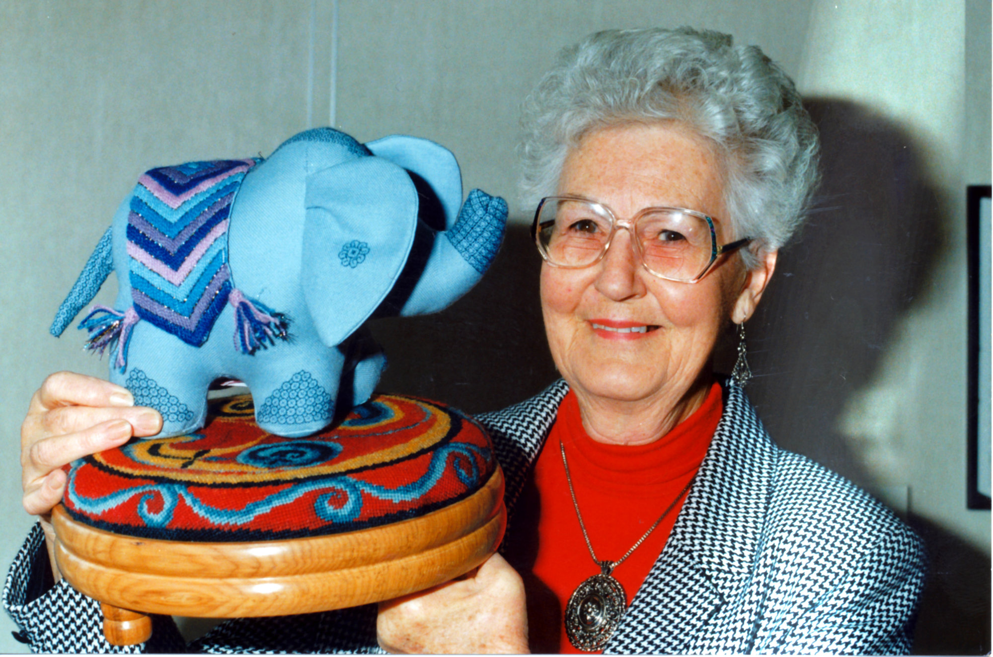 Community gallery; Embroiderers' Guild; Heather Brown with Vera Whiteley's elephant, Barbara Trangmar's stool.