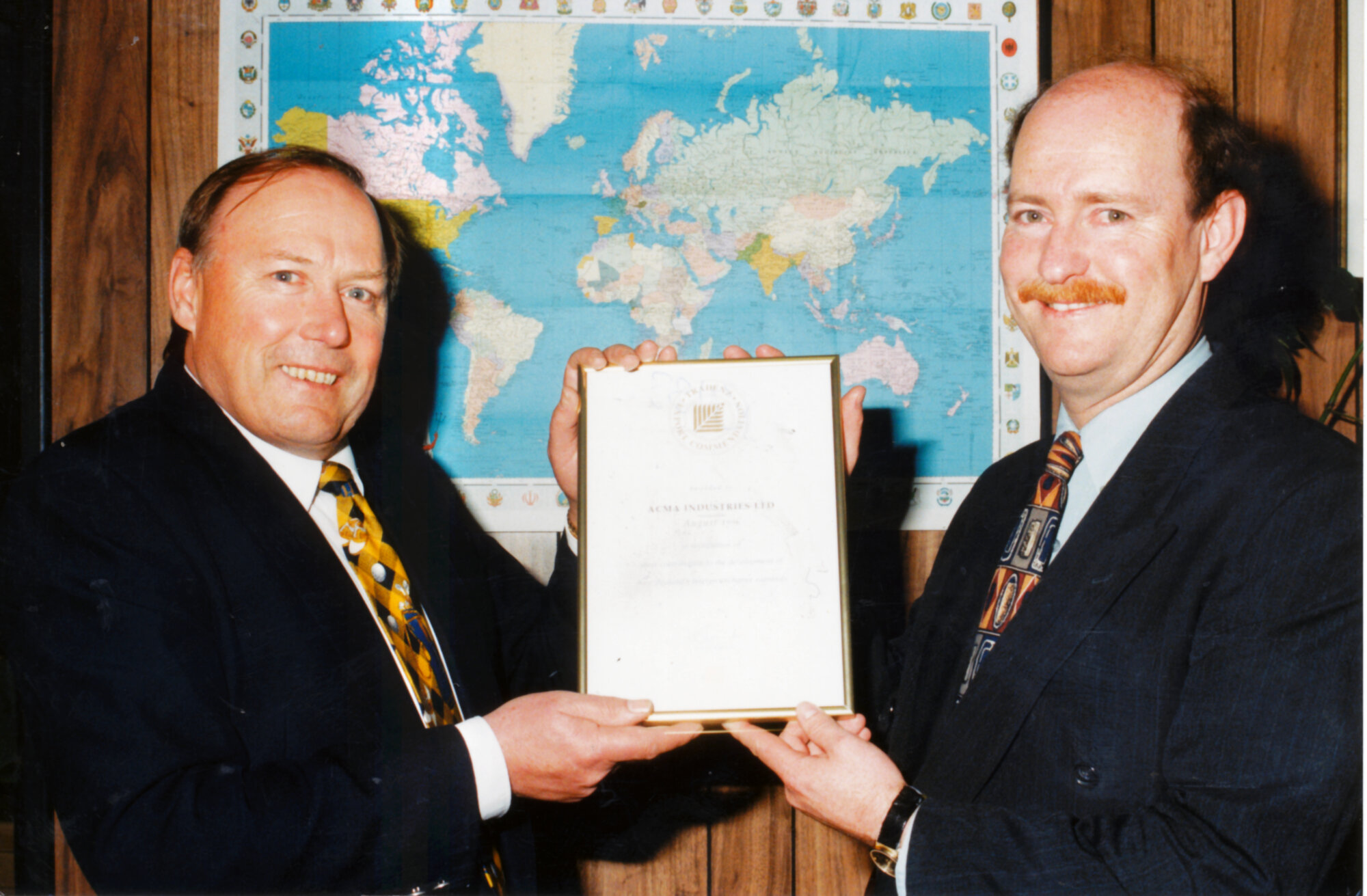 Acma Industries; managing director receives Tradenz award from Peter McCardle, M P.