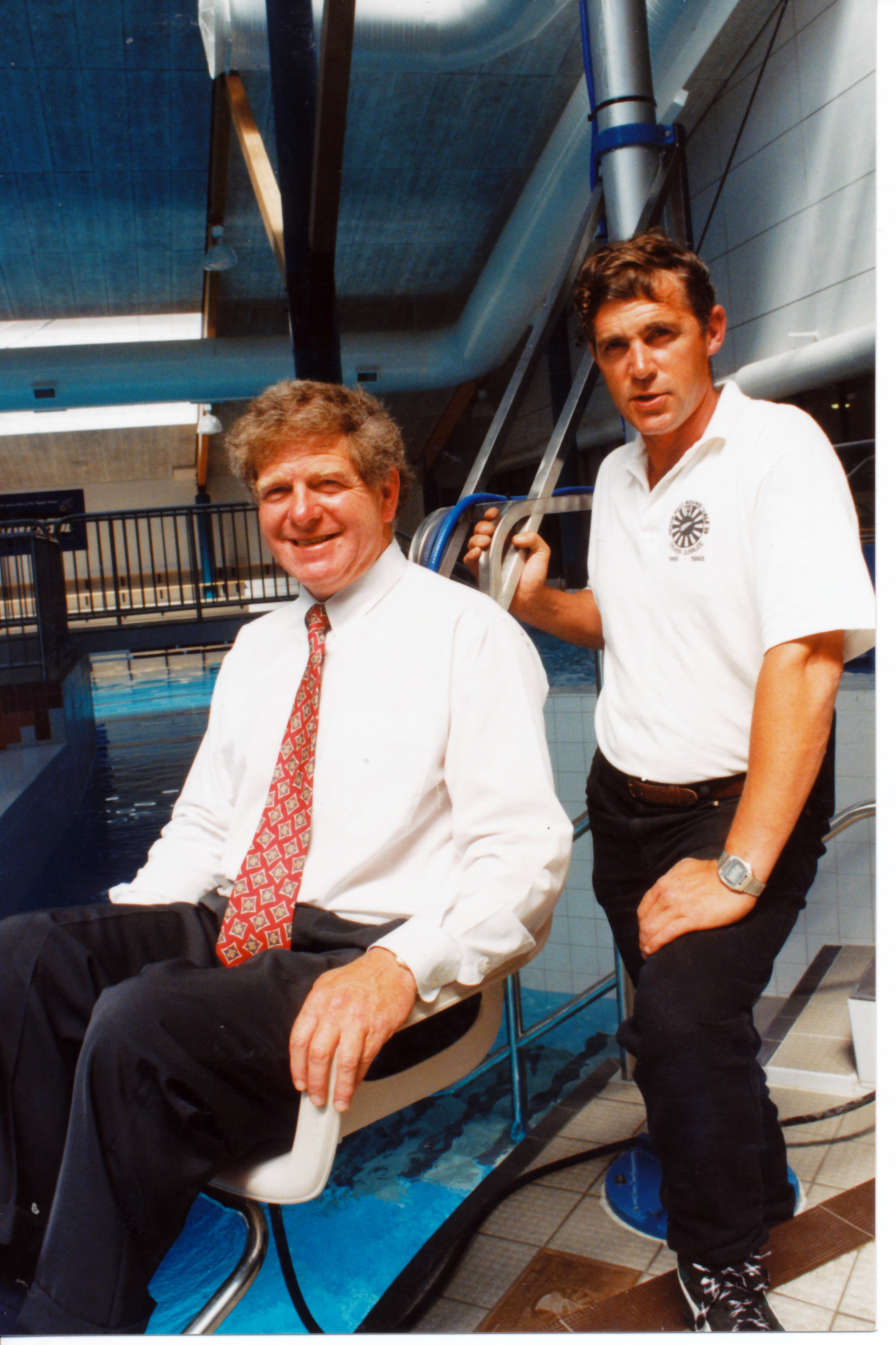 Round Table donates an Aqua Lift for disabled swimmers, and picnic tables