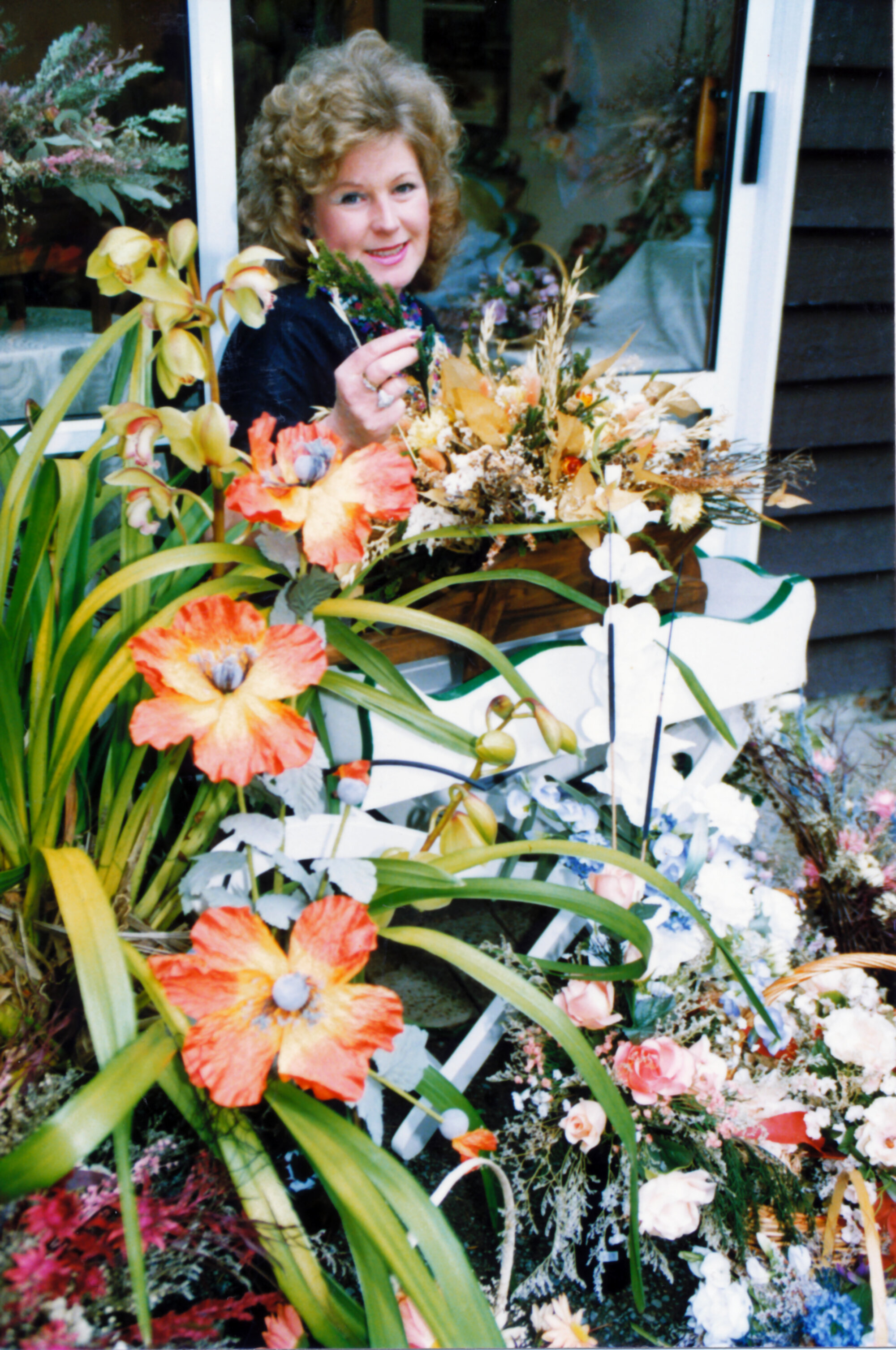 Rimutaka Sports Centre fund-raising; Angela Christofferson, of 'Floral Craft Cottage', 136 Akatarawa Road