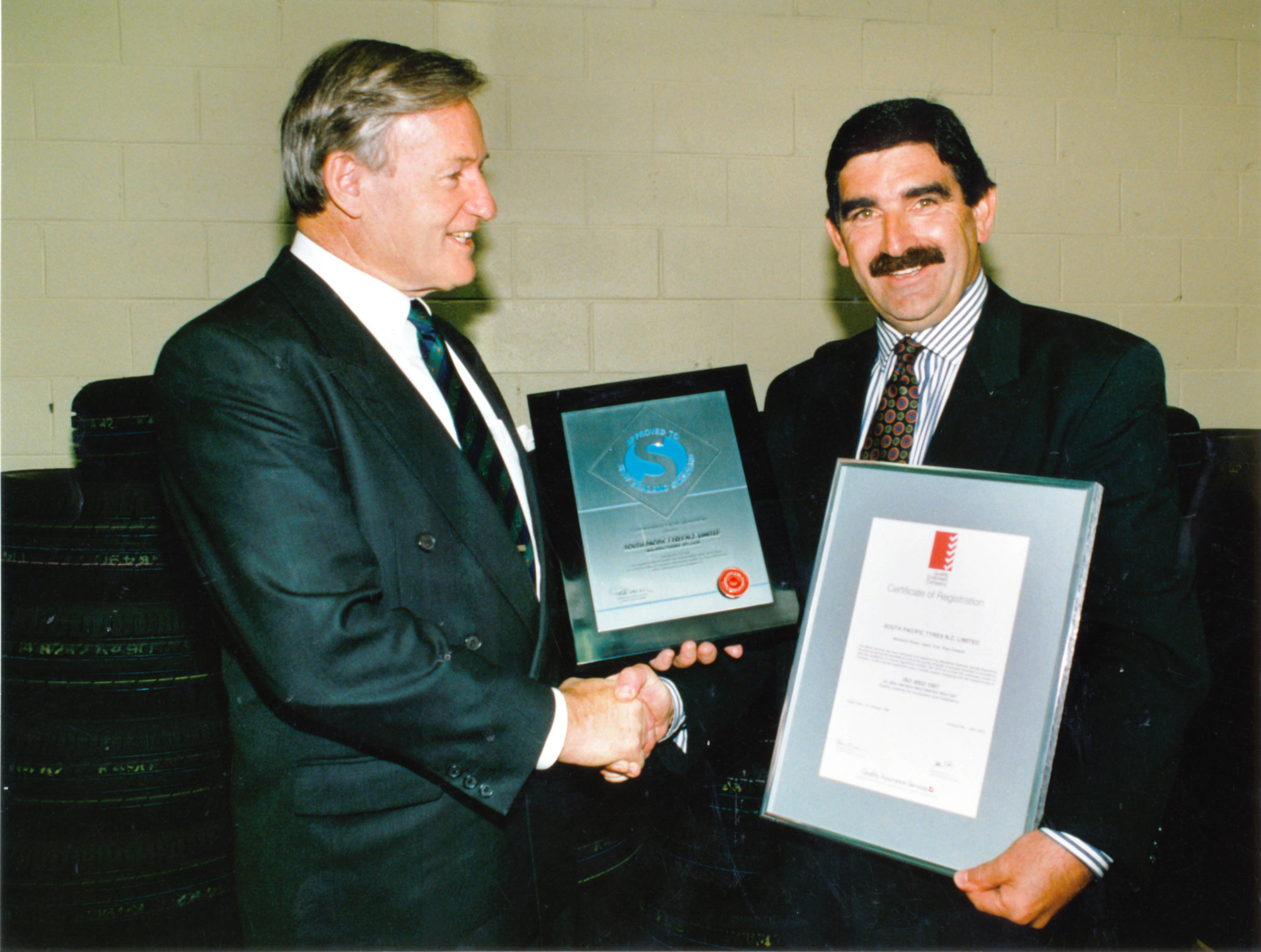 South Pacific Tyres factory quality standards; Prime Minister Jim Bolger, chief executive Lohn Gurrieri.