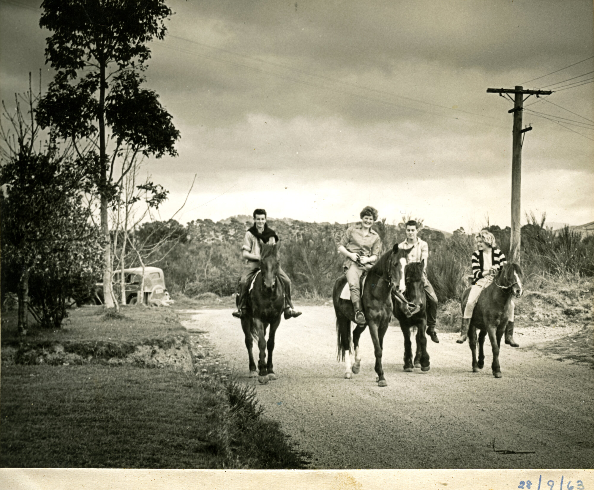Jackson family and friends; horse- riding in Paton Street 1963