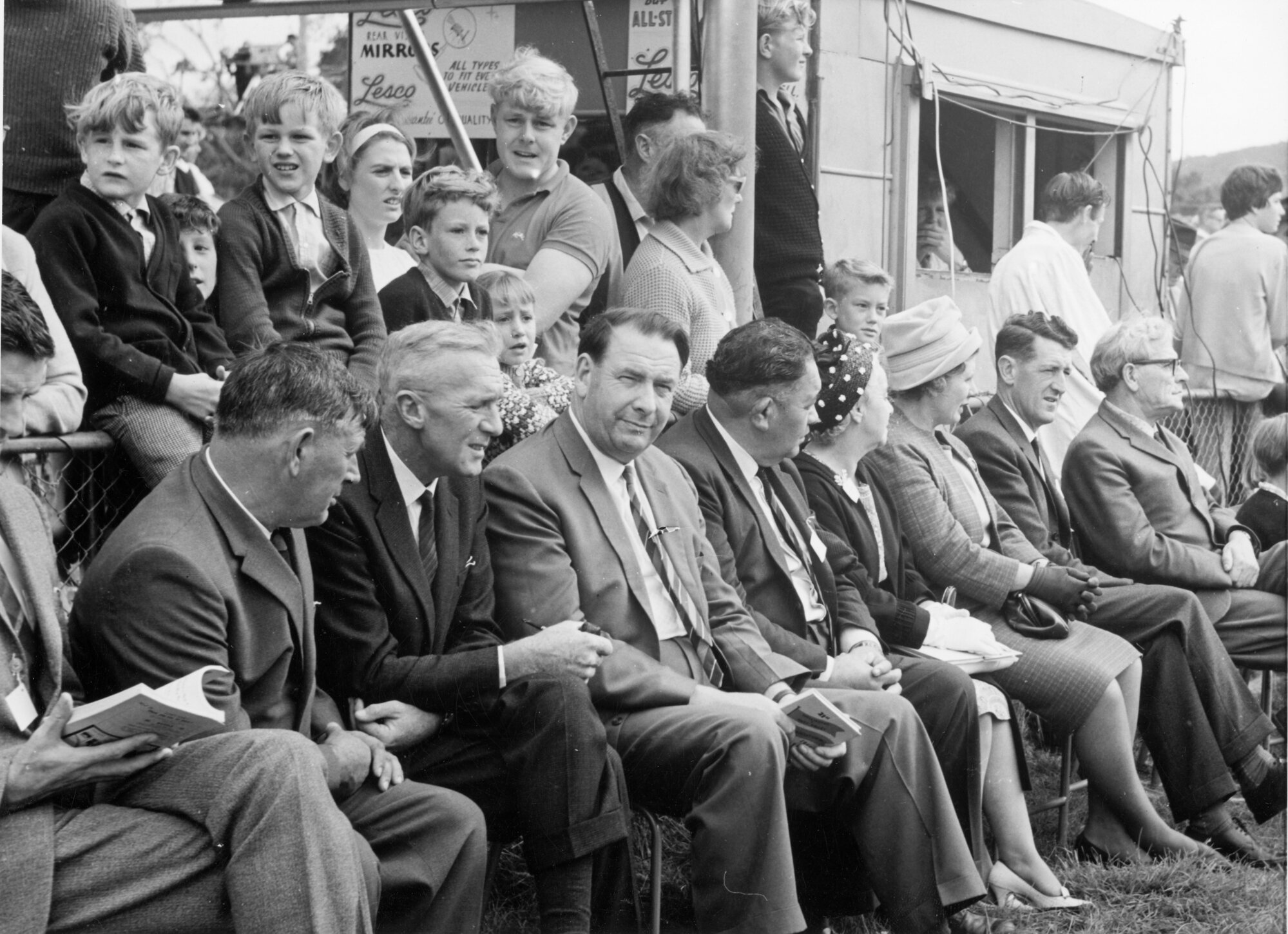 A &amp; P show; audience listening to president, Bob Christie; cropped print.