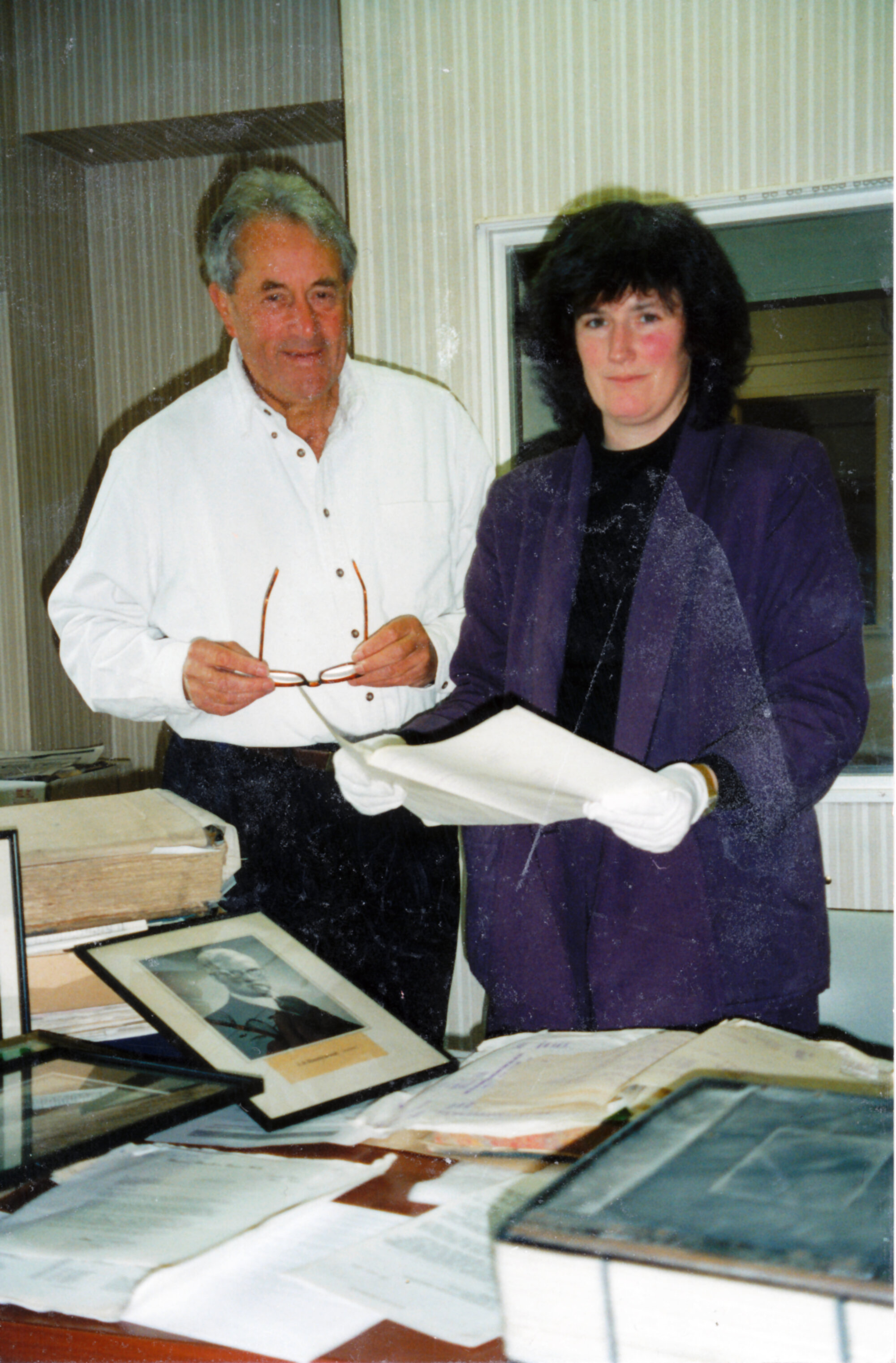 Library; Hazelwoods archives presented by Colin Gibbs to archivist Nicola Frean