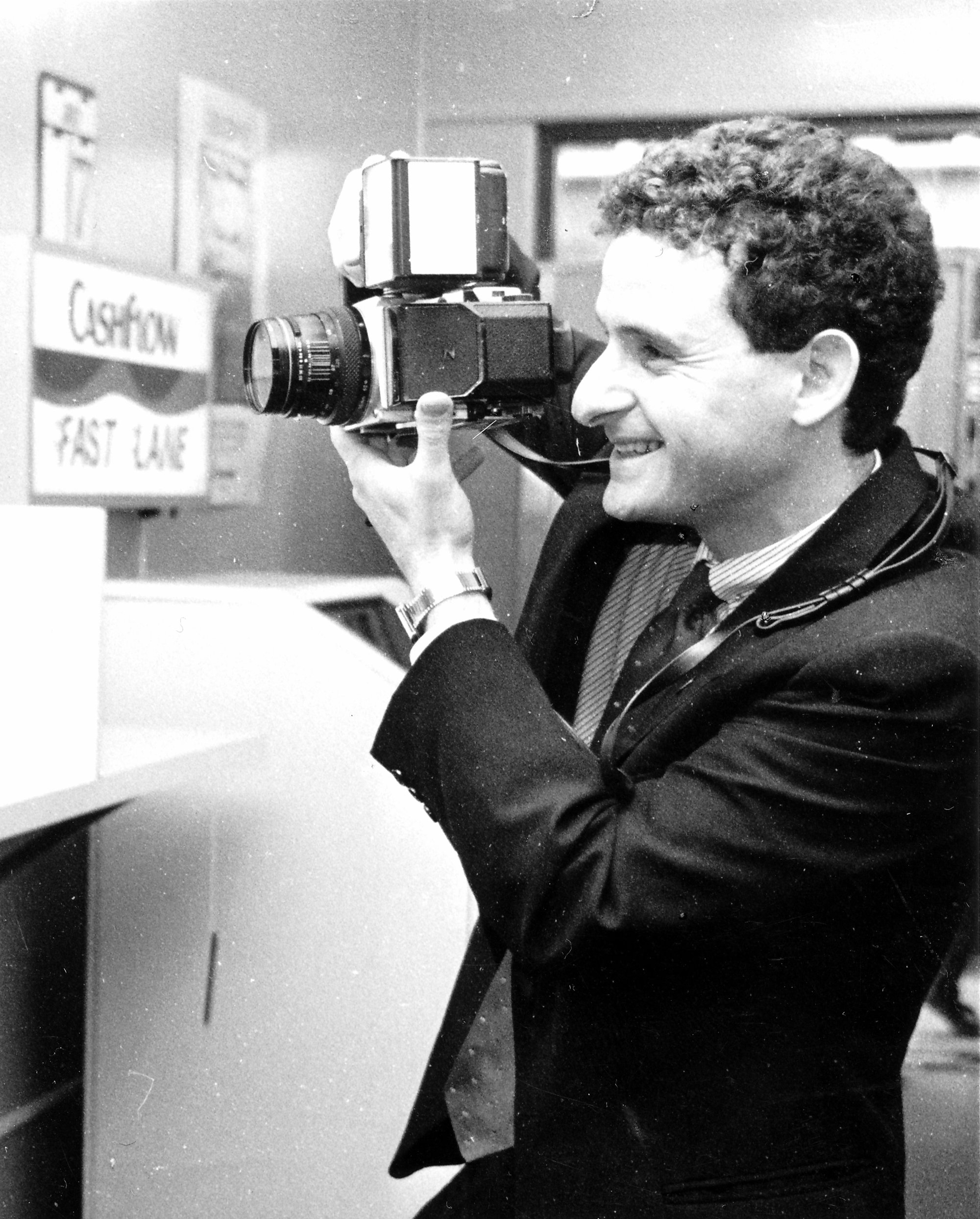 Simon Woolf, photographer, succeeds his father, Ronald, killed in a helicopter crash in November 1987.