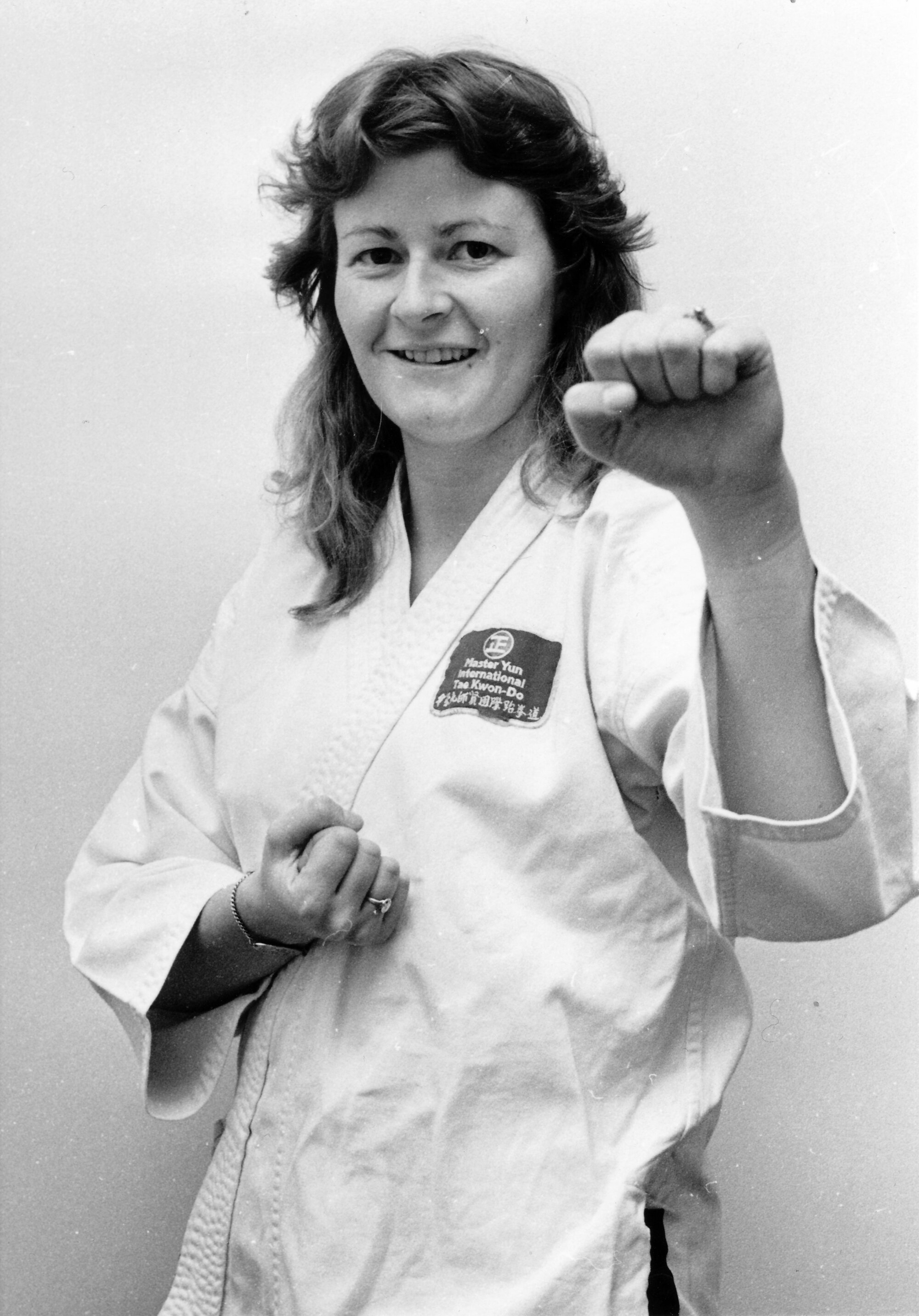 Jeannie O'Donnell, pricing analyst at General Motors, earns Taekwon Do black belt.