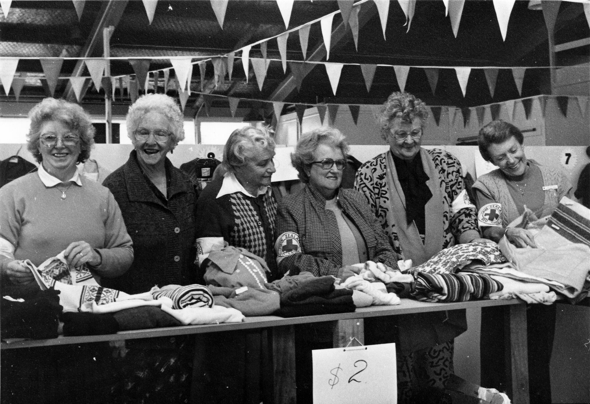 Red Cross clearance sale of winter clothing, to make room for summer stock.