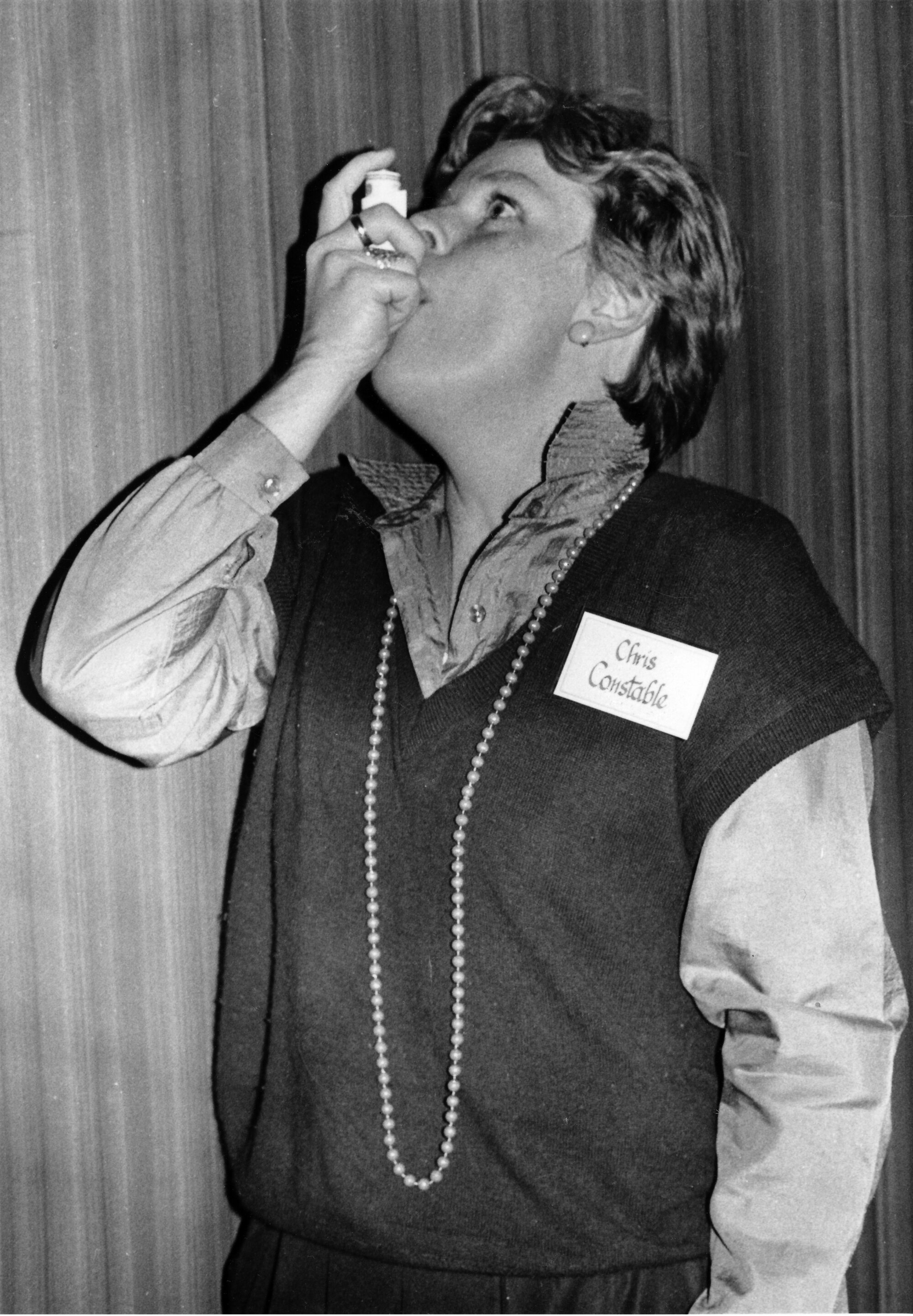 Chris Constable, development officer, Asthma Foundation of New Zealand, demonstrating an inhaler.