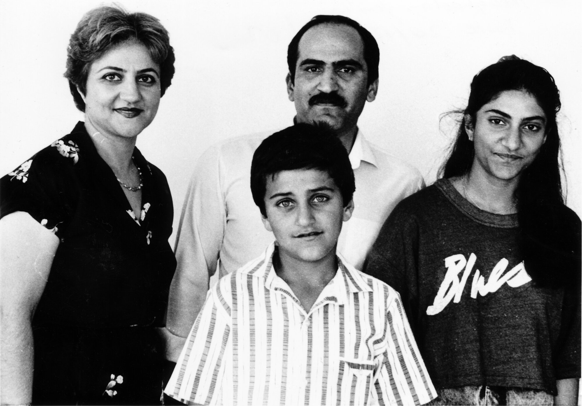 Moghadan family; Farahnaz, Seyed, children Nima and Nilram; Baha'i refugees from Iran.