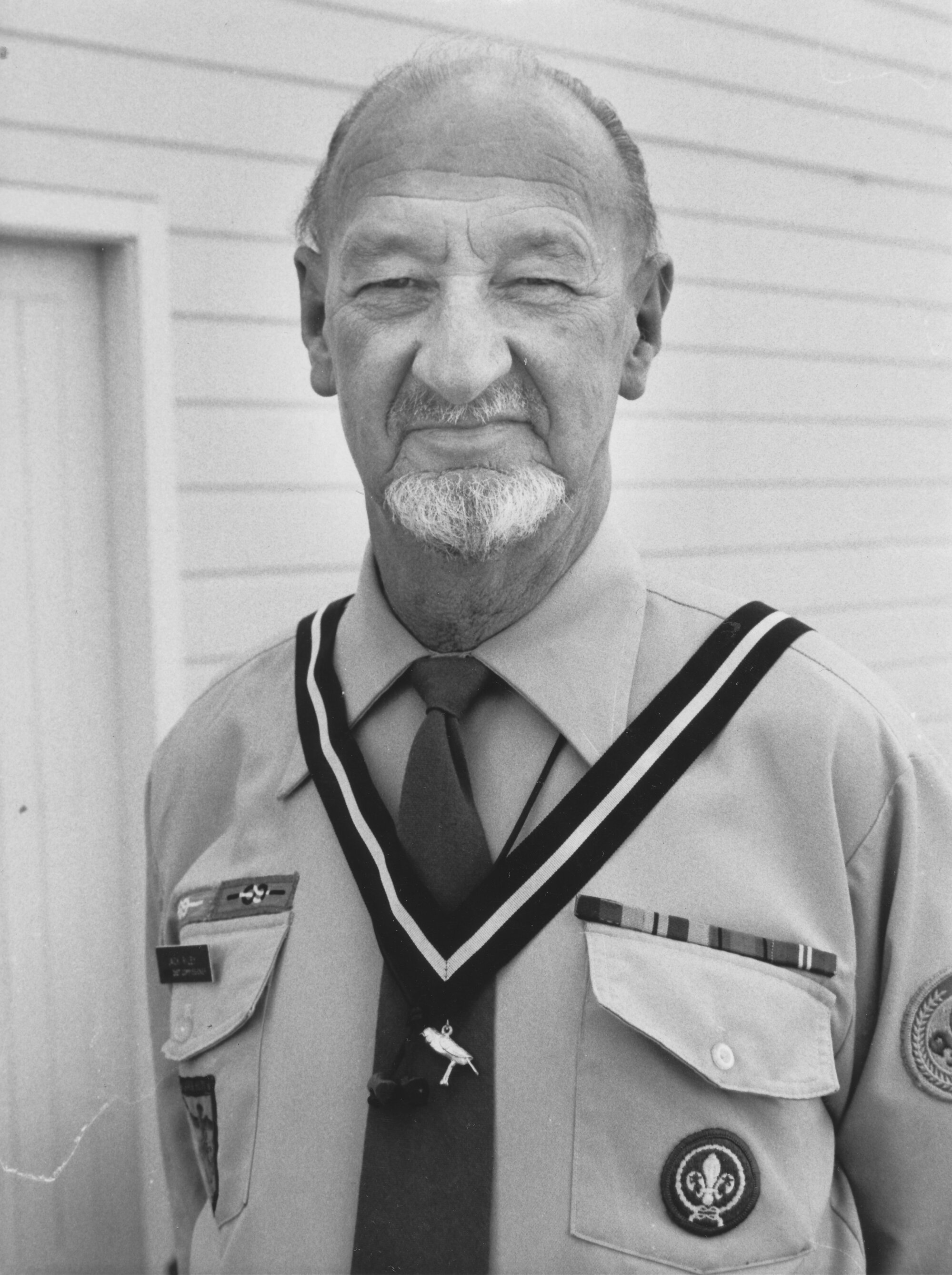 E S J 'Jack' Riley awarded New Zealand Scouting's  highest honour; the Silver Tui he's wearing.
