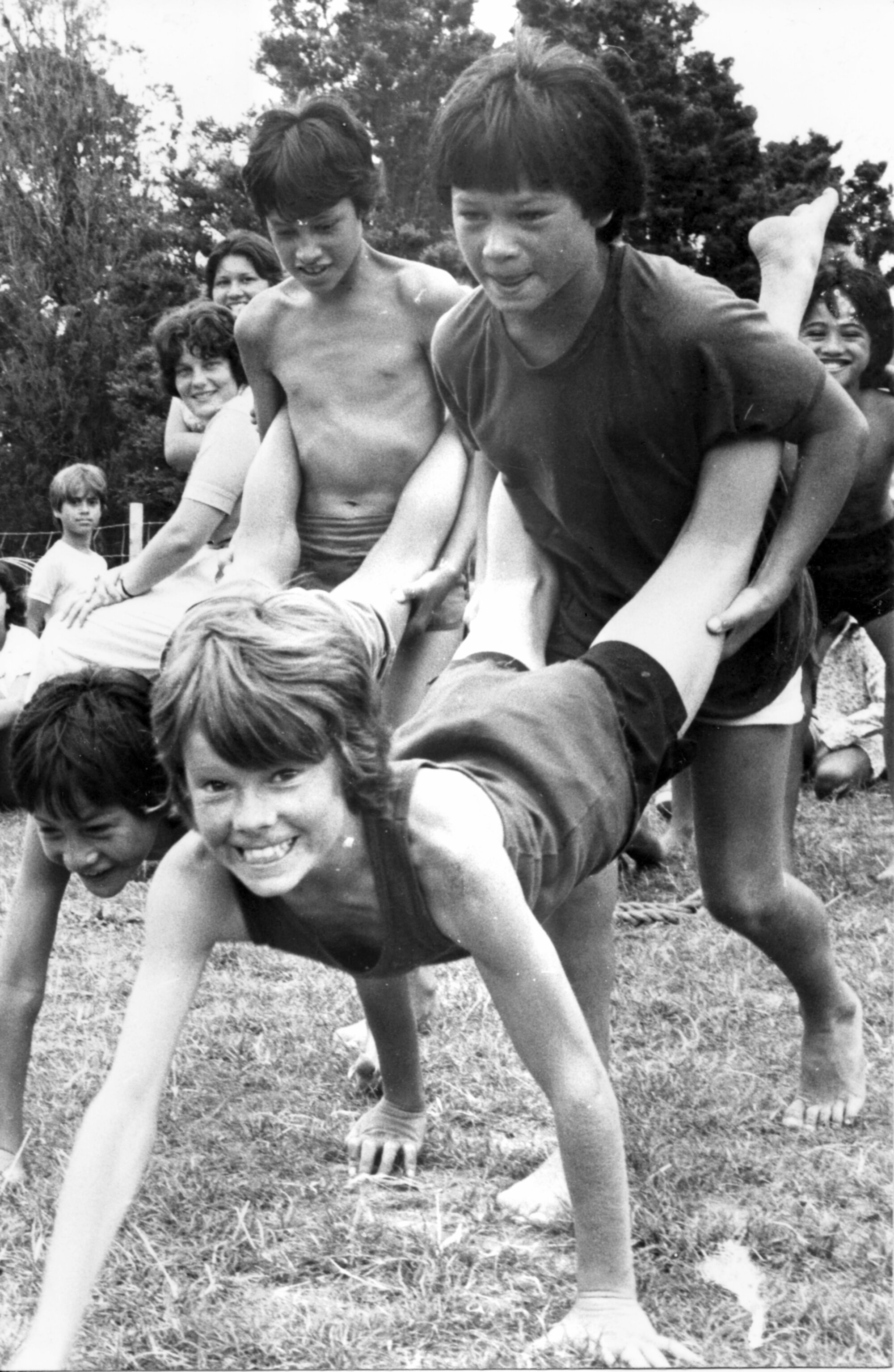 School holiday programme; wheelbarrow racers Mark and Kahu Walker, Matthw Walker and Darren Frost
