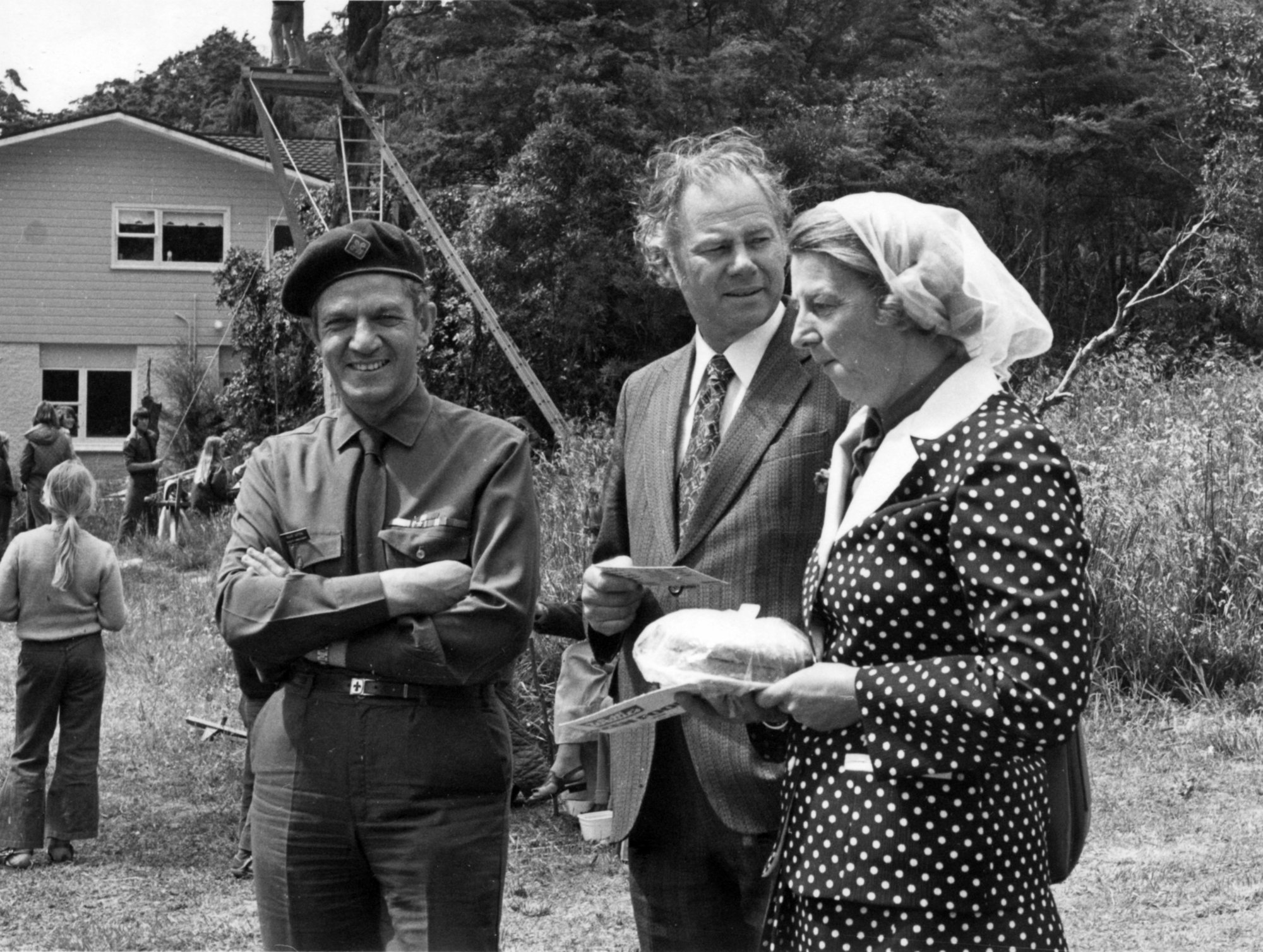 Scouts: Ron Bailey and wife with District Commissioner R Sutton at Pinehaven group display