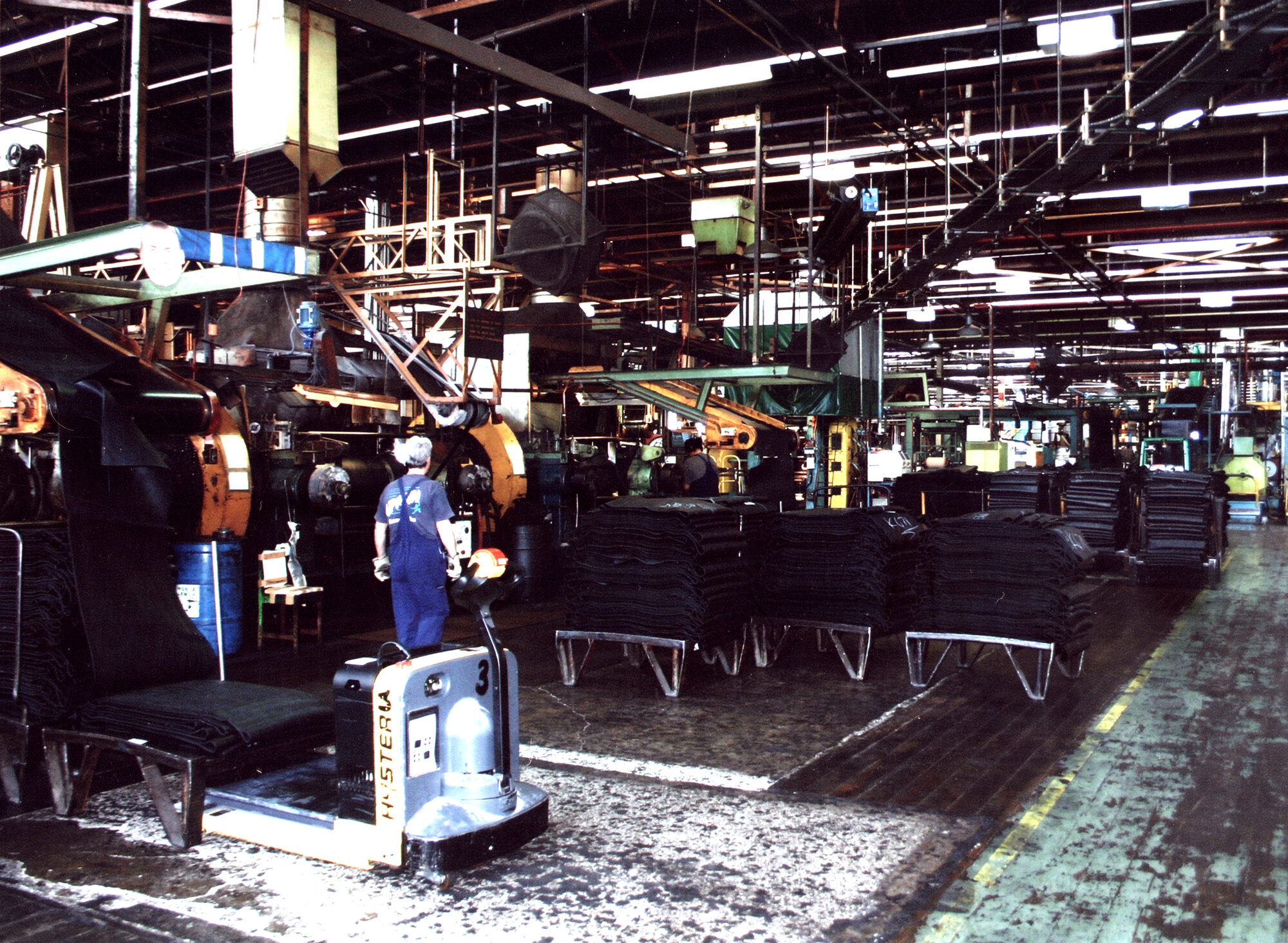 Dunlop raw materials; mixing mills, fabric and insulation calenders.