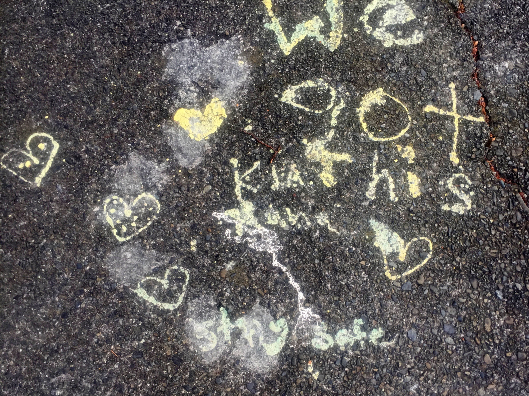 "We got this, kia kaha, stay safe" message painted on pavement, Pinehaven