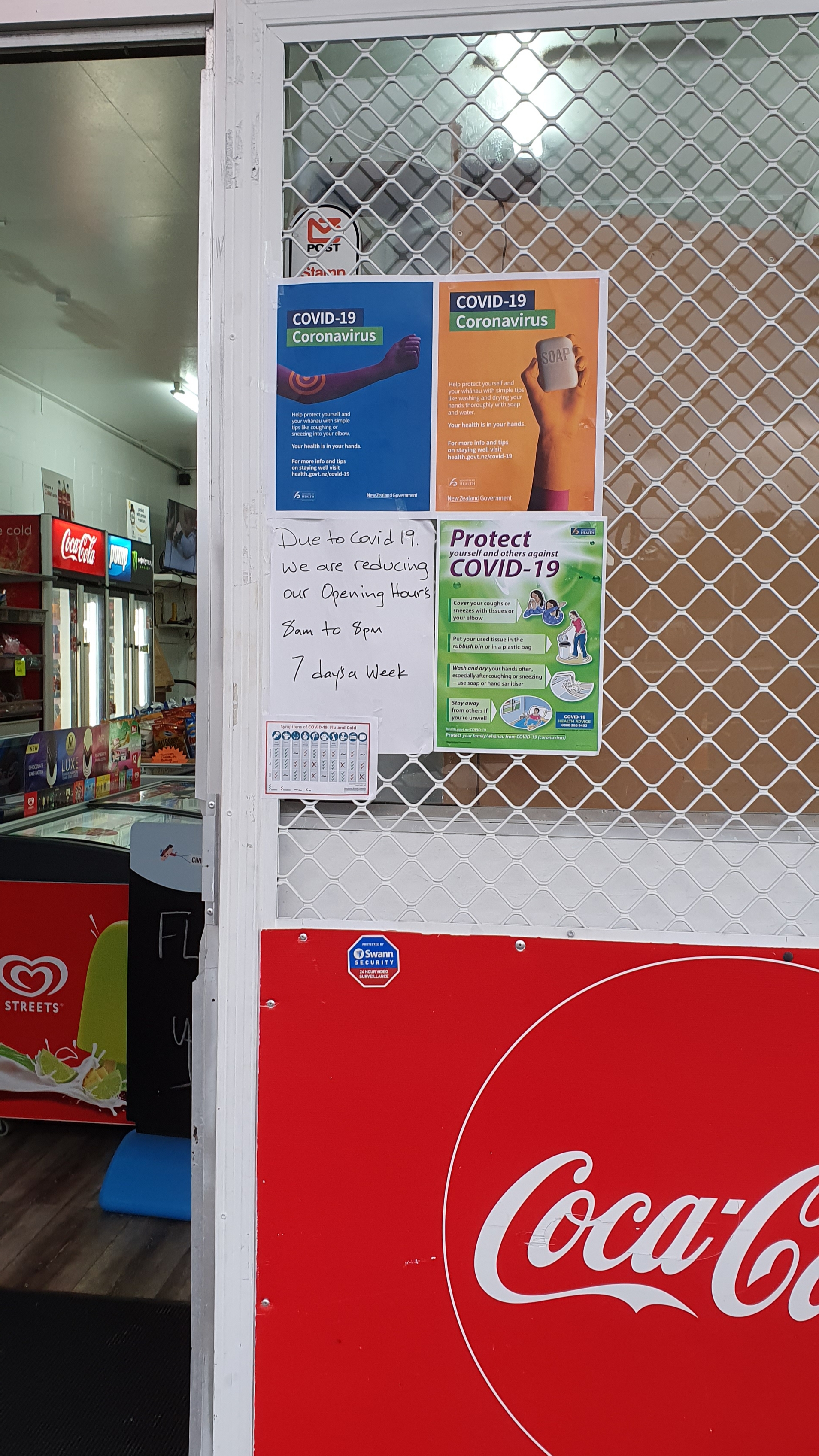 Covid-19 notices at entry to Racecourse Dairy, Trentham