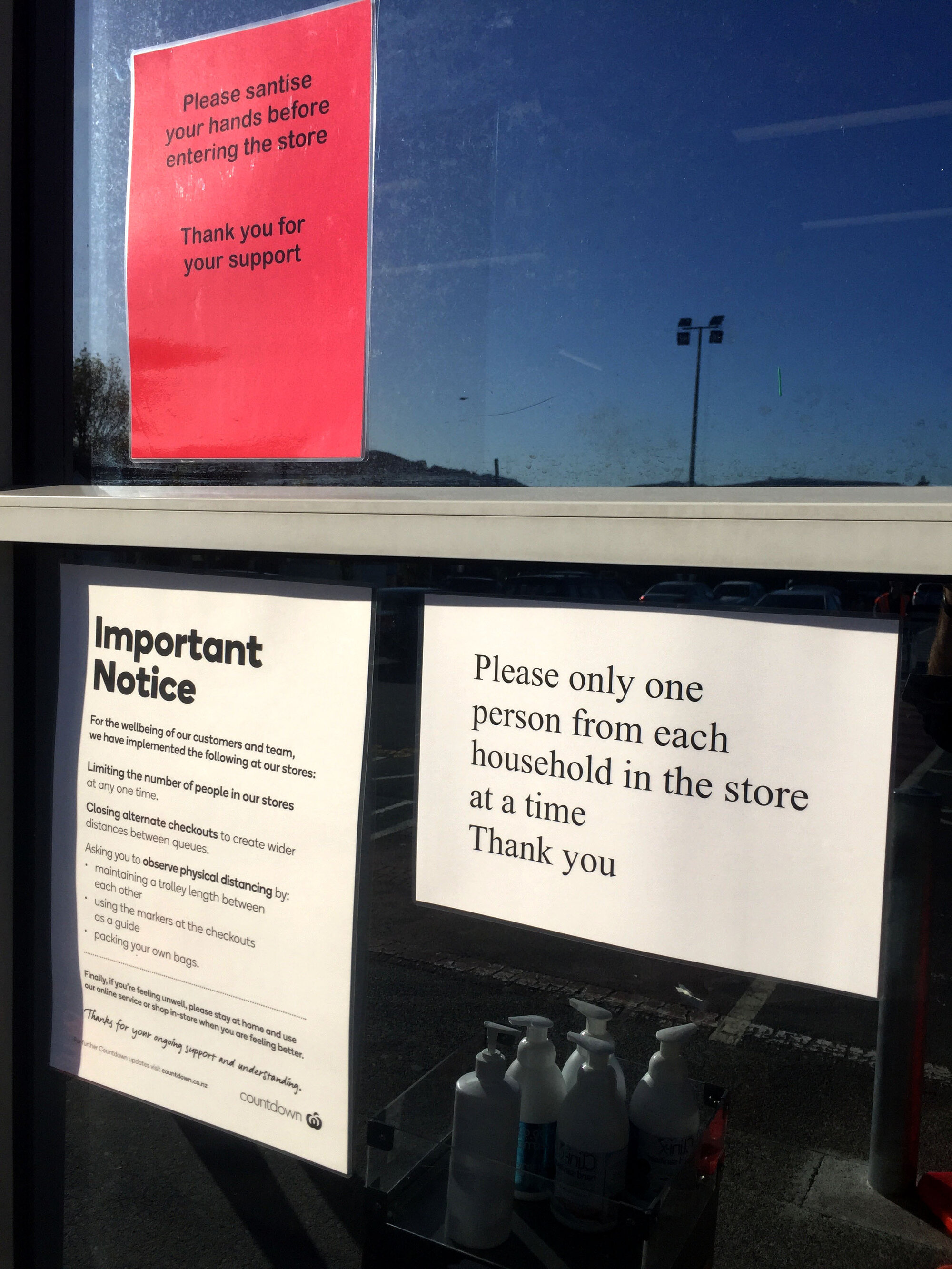 Covid-19 signs at entrance to Countdown supermarket on Queen Street 