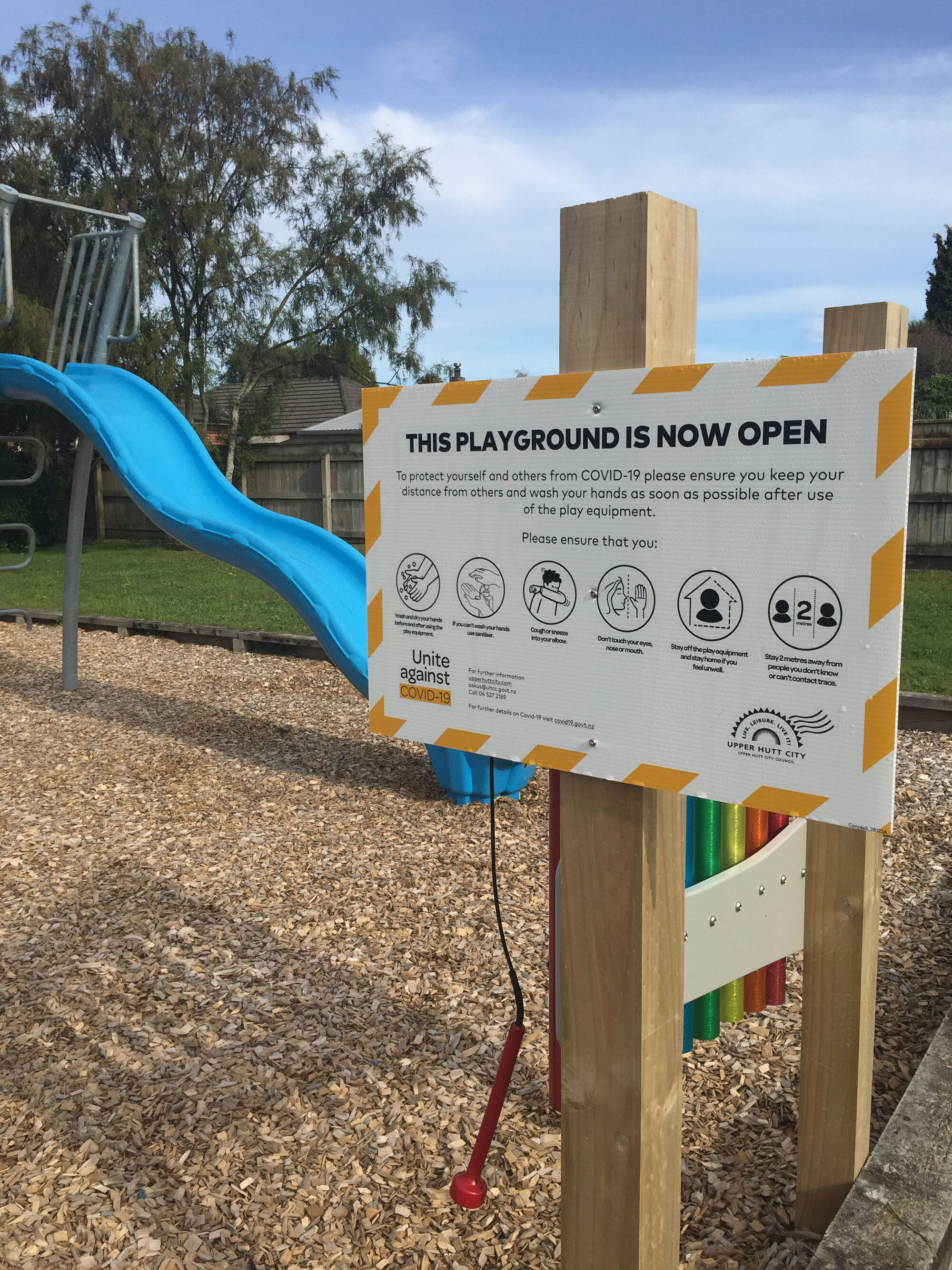 Level 2 "Playground Now Open" sign
