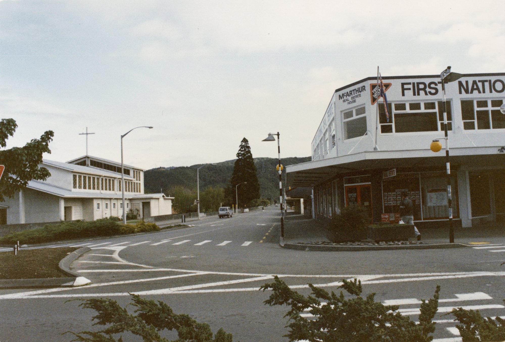 Main Street 1989  1; Pine Ave, looking north; St. Joseph's Church on one corner.