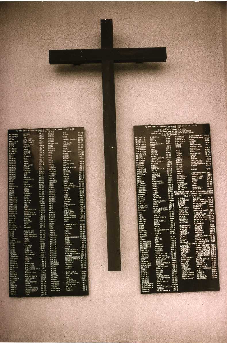 St Joseph's Catholic Church of 1965; lawn cemetery memorial plaques.