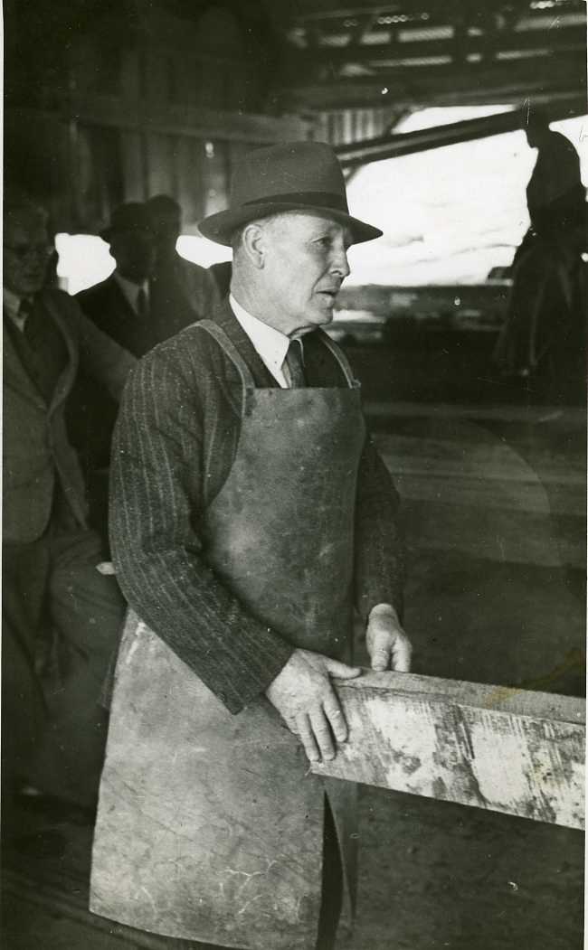 Timber industry; sawmill; Mr Jim Maher M.P., Otaki, cutting first flitch.