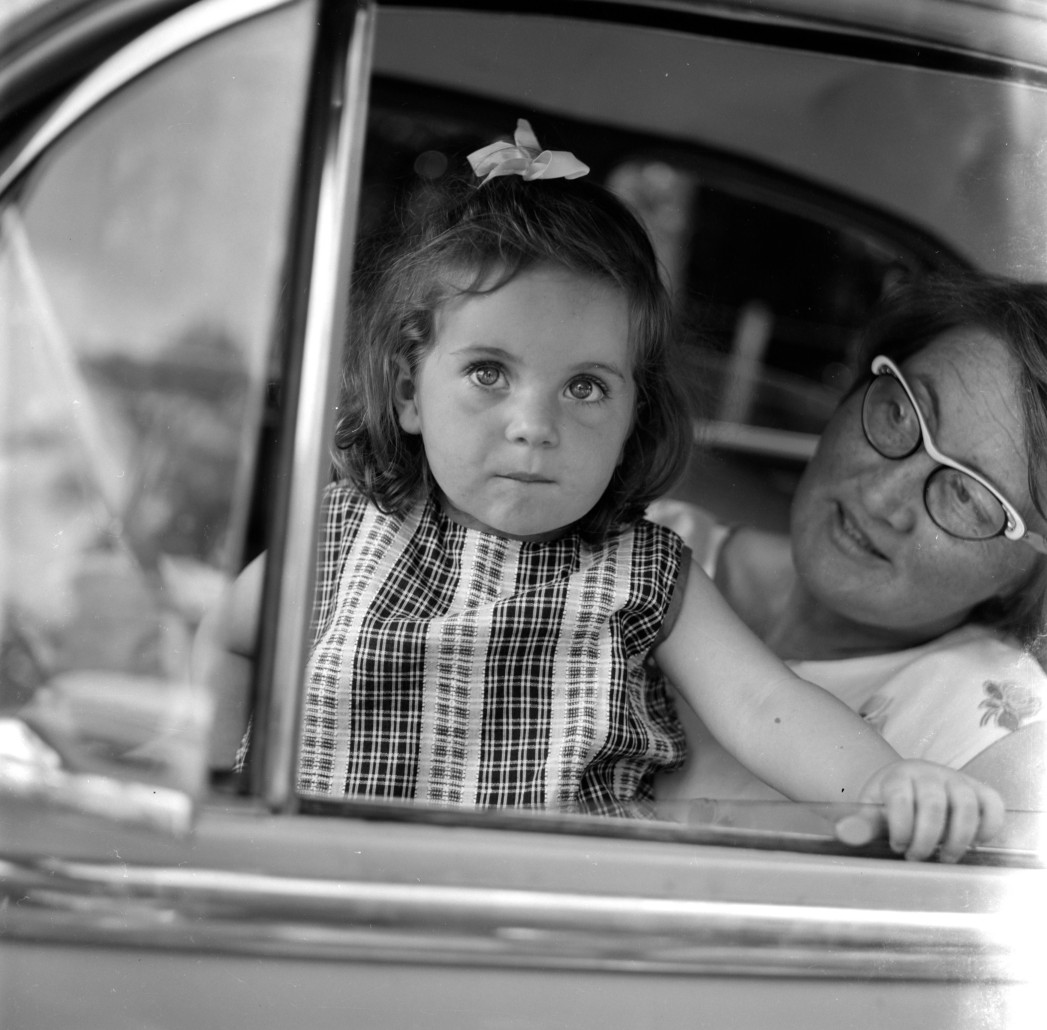 Quinn's Post Christmas party; young girl with ribbon in hair.
