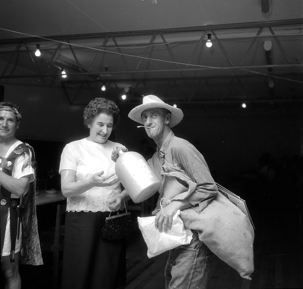 Dunlop Christmas social; Caesar, left; Maureen Thomas central.