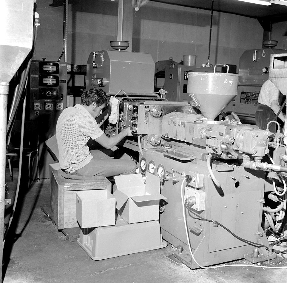 Consolidated Plastics factory; moulding machine. [P1-3442-5832]