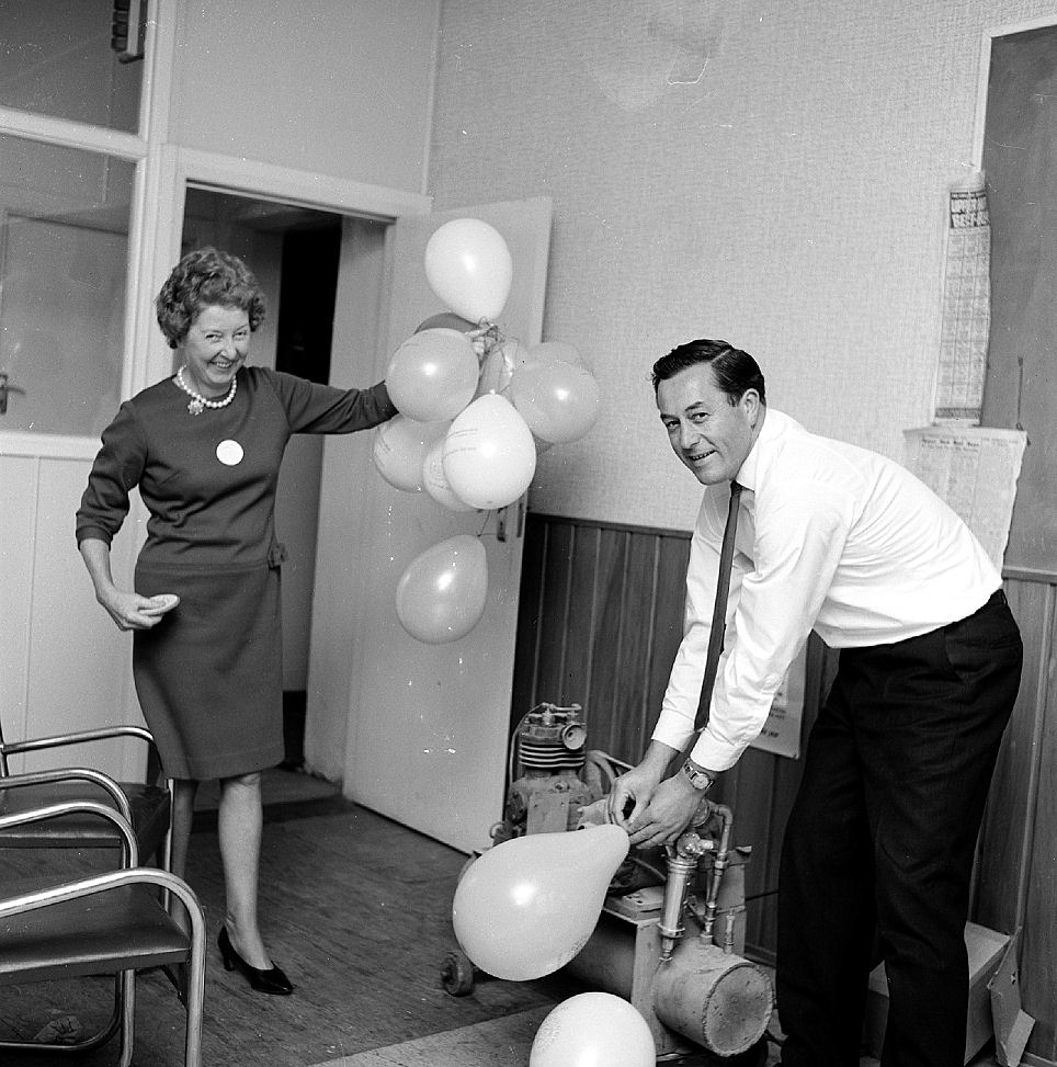 Hazelwoods Women's Day; Colin Gibbs and Mrs Codyre inflating balloons.