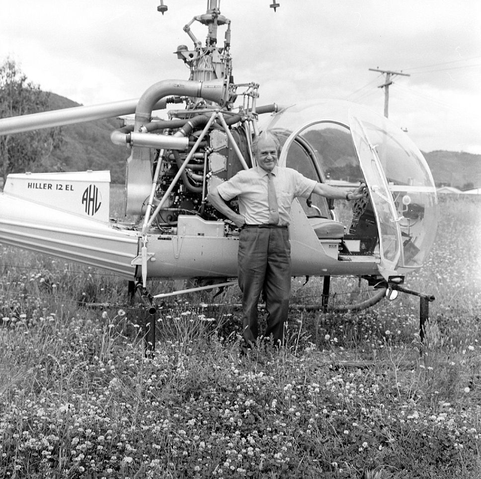 Peter Klocek and Hiller H12 helicopter. [P1-5104-7494]