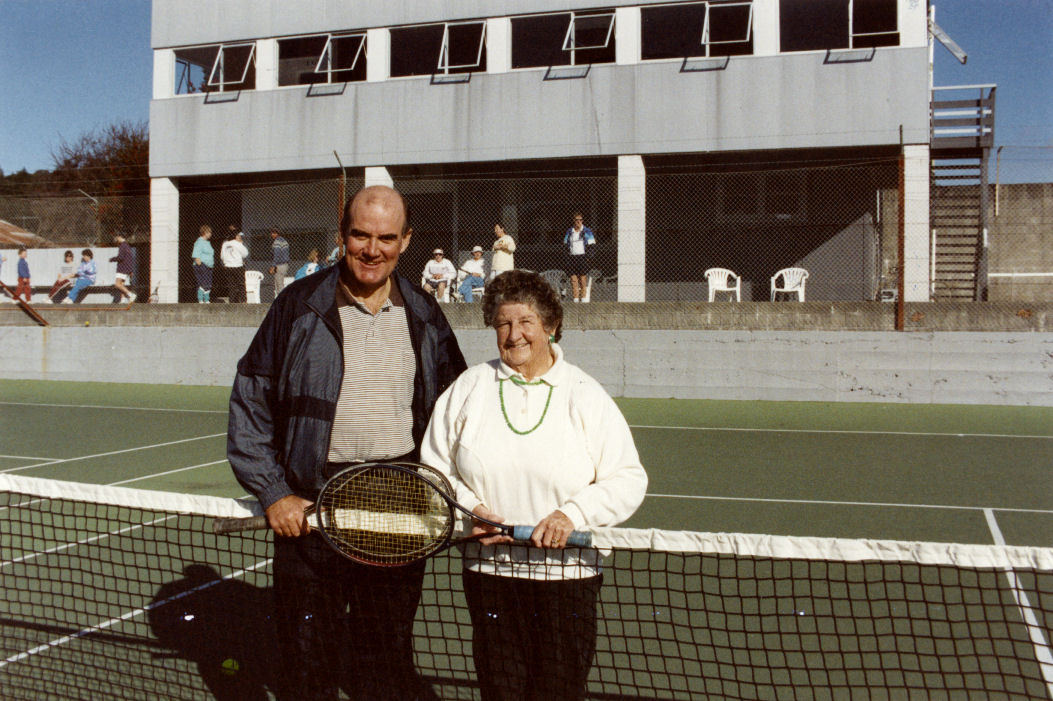 Upper Hutt Tennis Club 1995; president Ian Wallis, with new life member Kath Meachem.