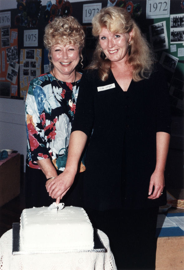 Tawhai School 25th anniversary; Val Campbell, Vicki Wright cut the cake.