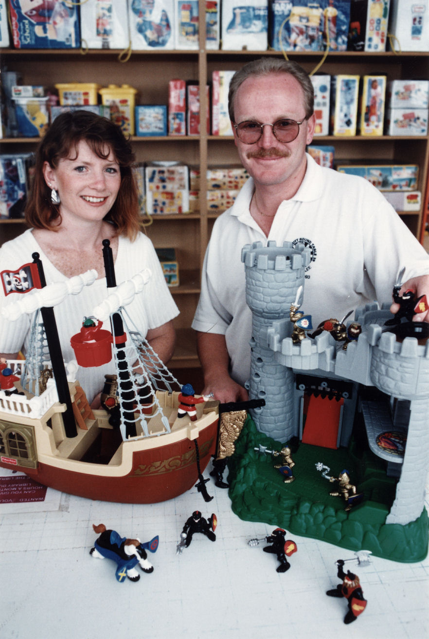 Toy Library; committee member Sonia Curry and Round Table treasurer Ian Charles.
