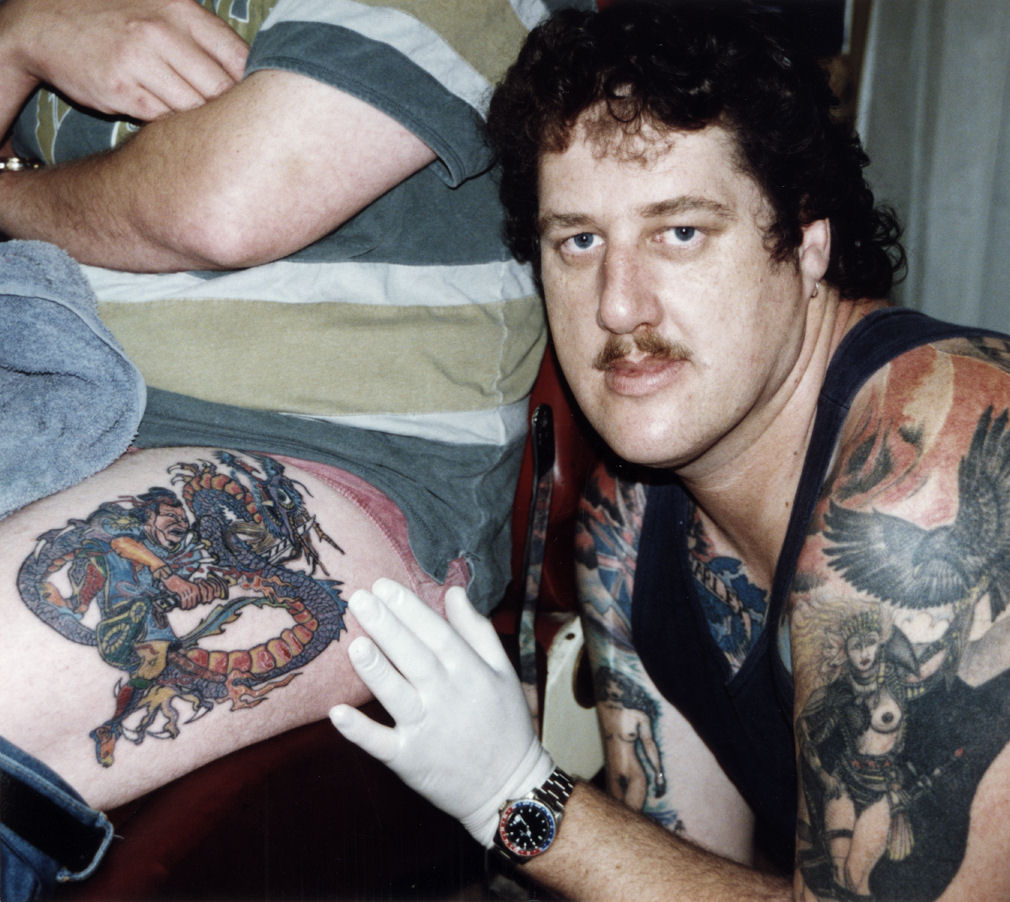 Tattooist Howard Pink with his tattoo that won the "best colour section" at the national show.
