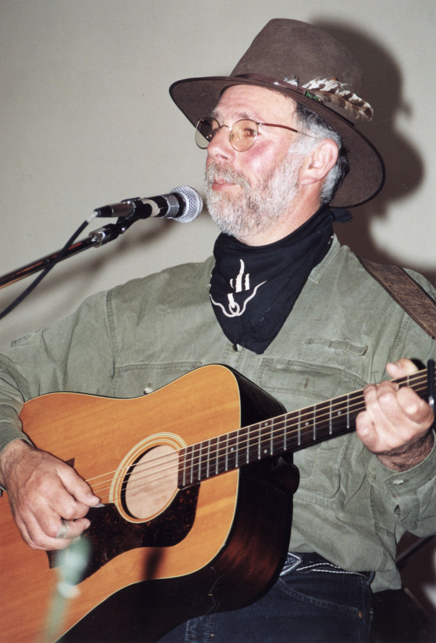 Country Music Club; annual charity concert; singer and guitar picker John Grenell.