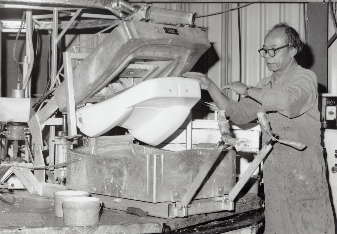 Acma Industries, 71 Montgomery Crescent; Rady Hendi takes polyurethane car seat out of mould.