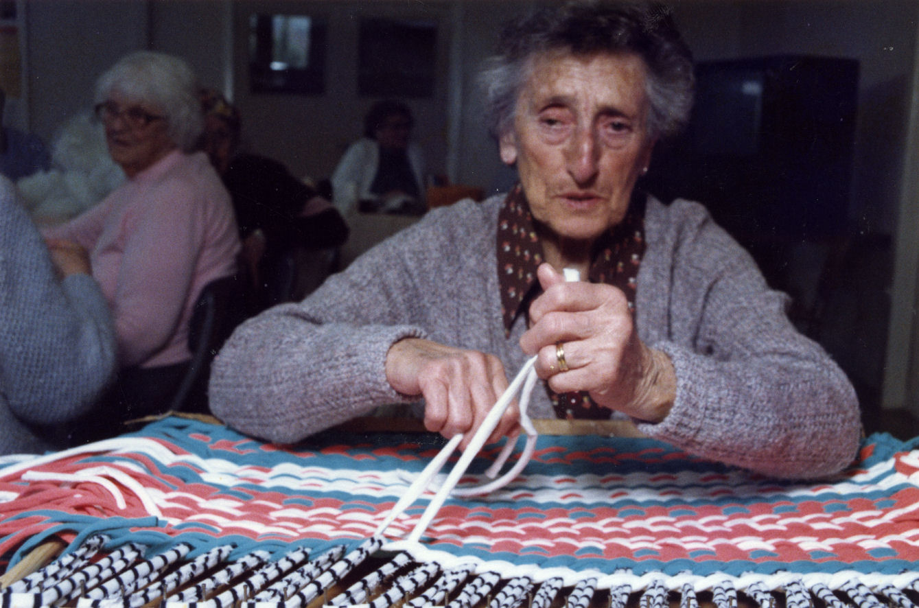 Braille week; Minnie Smith making a bathmat completely by touch.