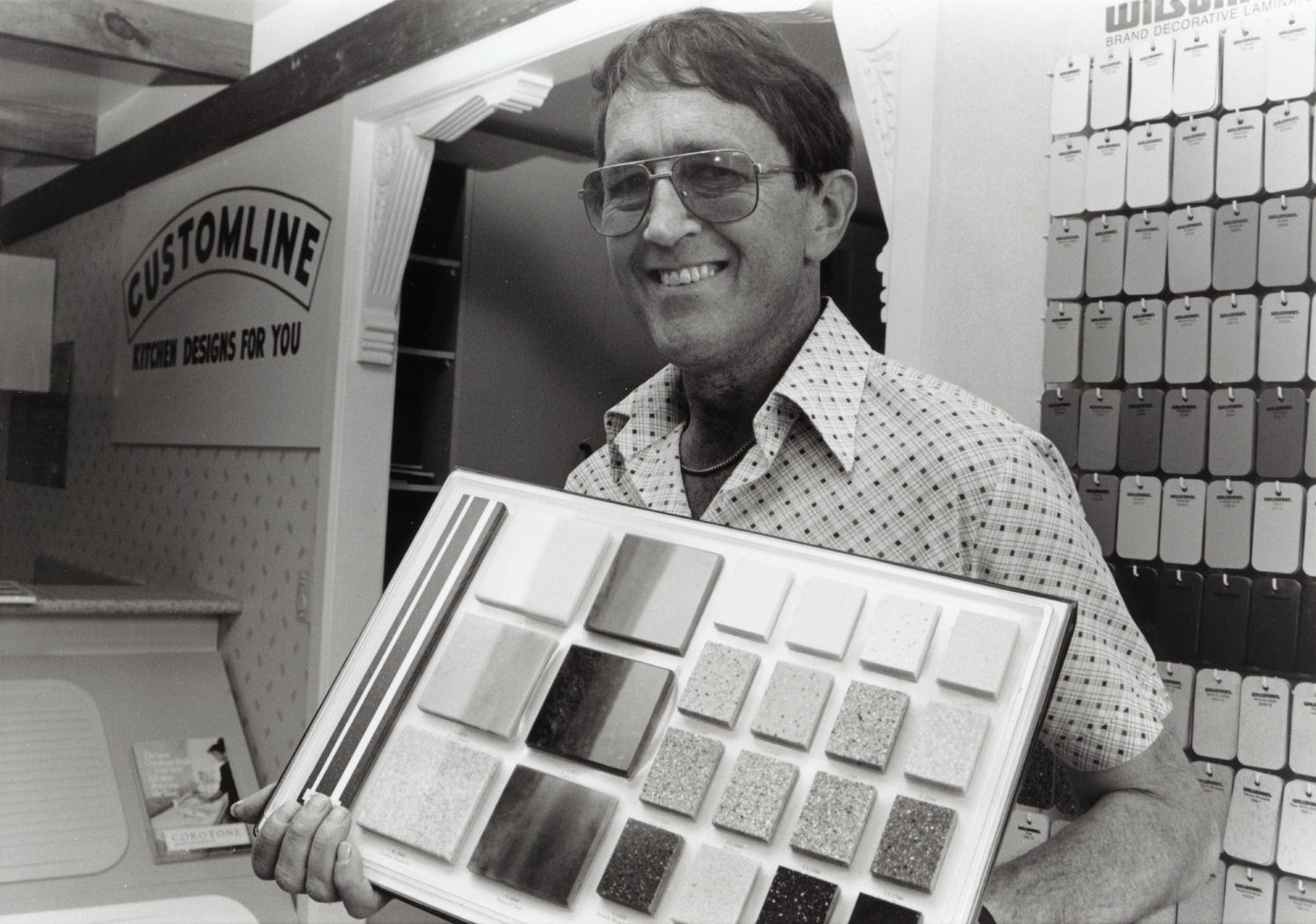 Customline Kitchens &amp; Joinery Ltd, 63-65 Montgomery Crescent; Colin Vibert with Avonite bench-top surfacing samples.