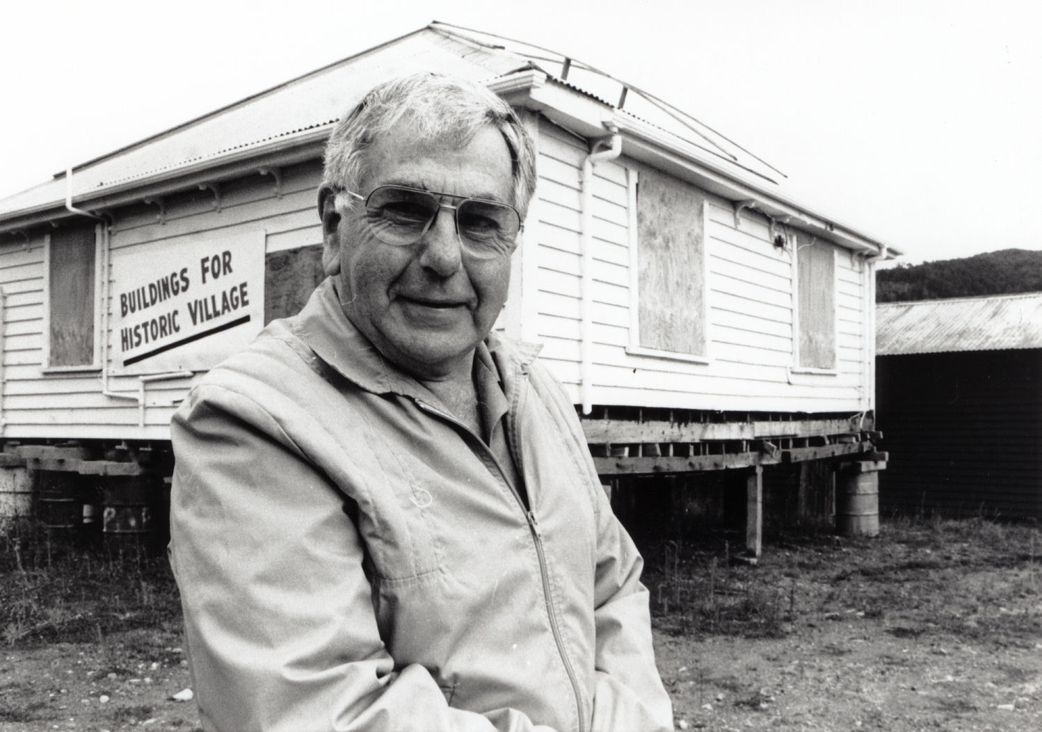 Jina's Fruit Mart; the old building and Historic Village Society President Keith Davis.