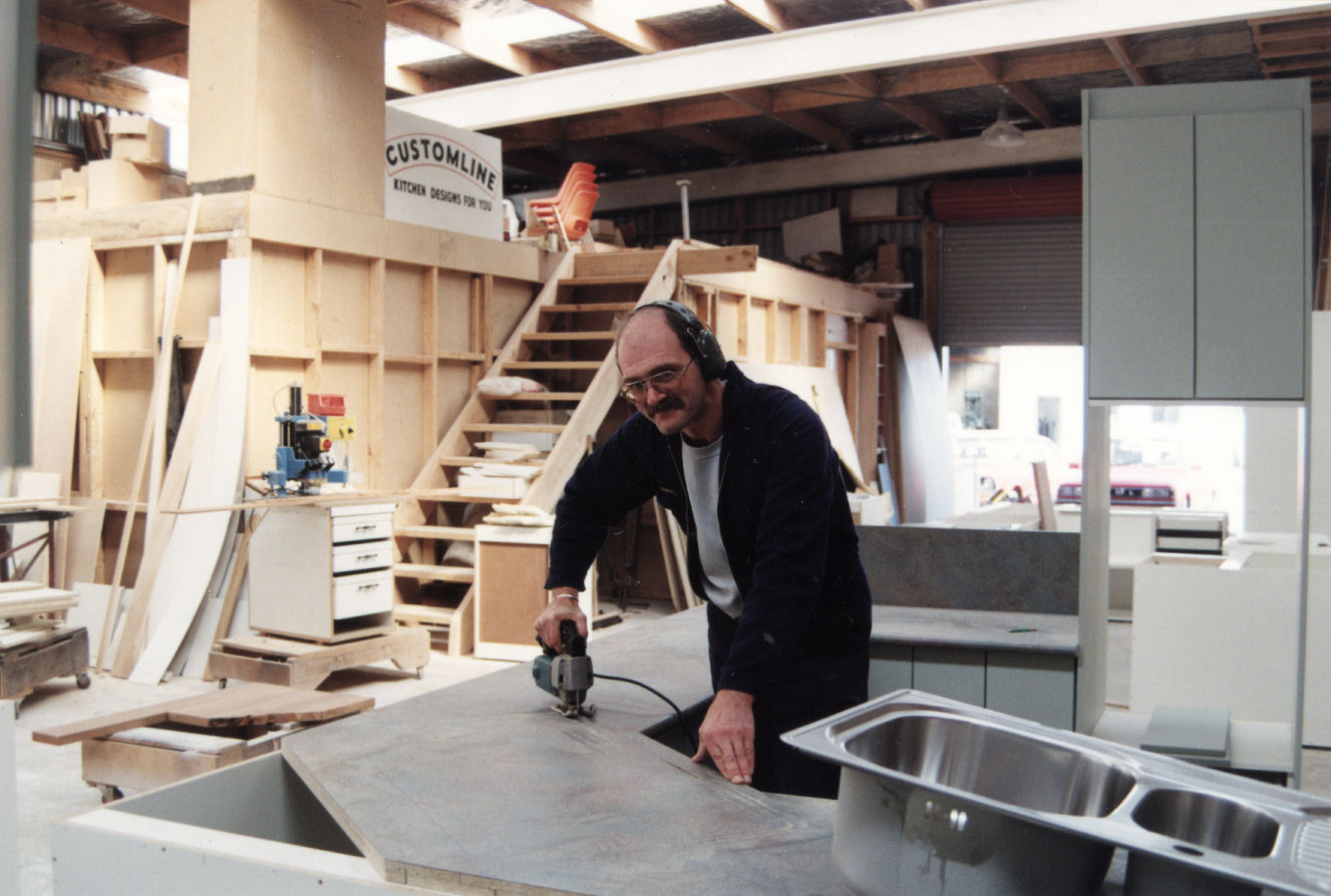 Customline Kitchens, 33A Montgomery Crescent; co-owner Derek Lill hard at work.