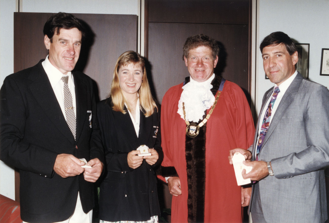 Former Olympic cyclists Harry Kent, Jacqui Nelson, Neil Lyster receive Olympic Games pins.