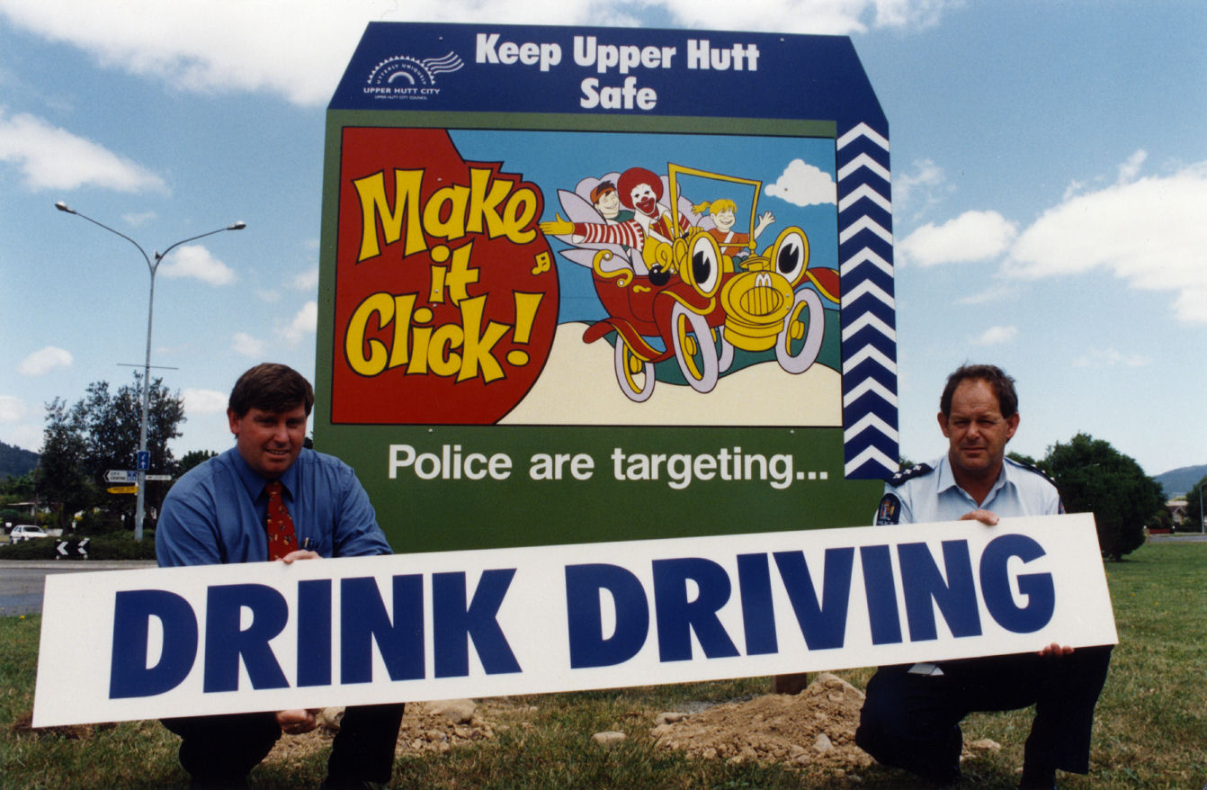 Road safety signs sponsored by McDonald's; Gibbons Street entrance to River Road.