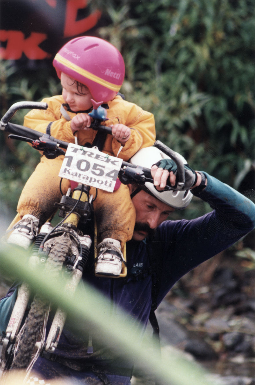 Cycling; Karapoti Classic, 1999; Bill Brierley and his 23-month-old daughter Odette cross the Akatarawa River.