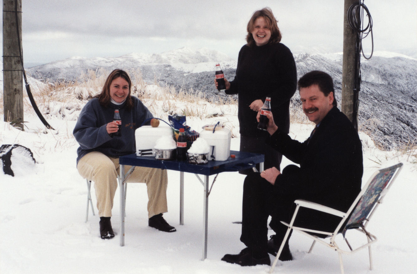 City Council staff collecting snow on Mt Climie