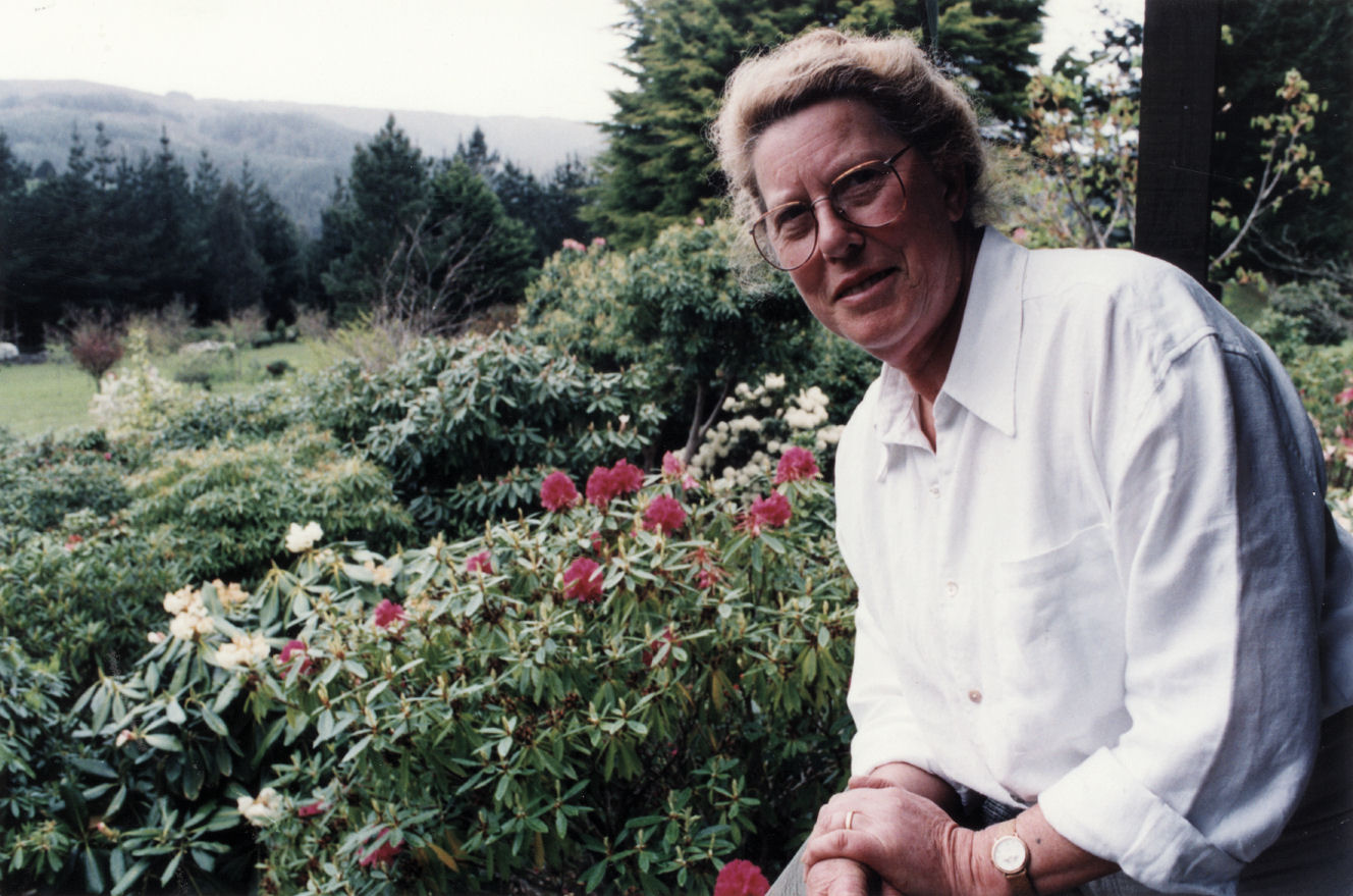 Efil Doog Garden of Art co-owner Shirley Cosgrove and rhododendrons.