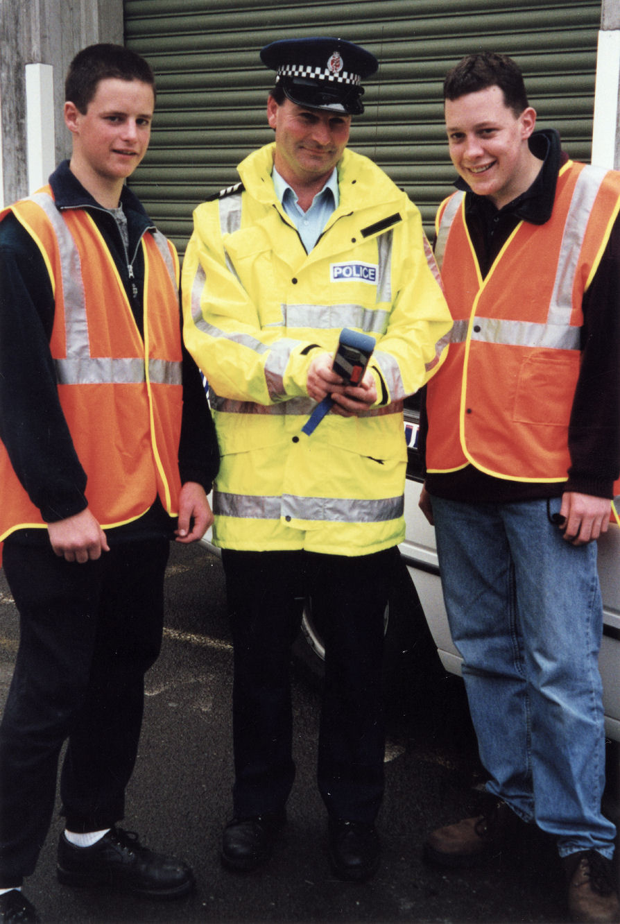 HIBS; Hutt International Boys' School SADD students Gareth Morrison, Matt Jackson with Sergeant John Press.
