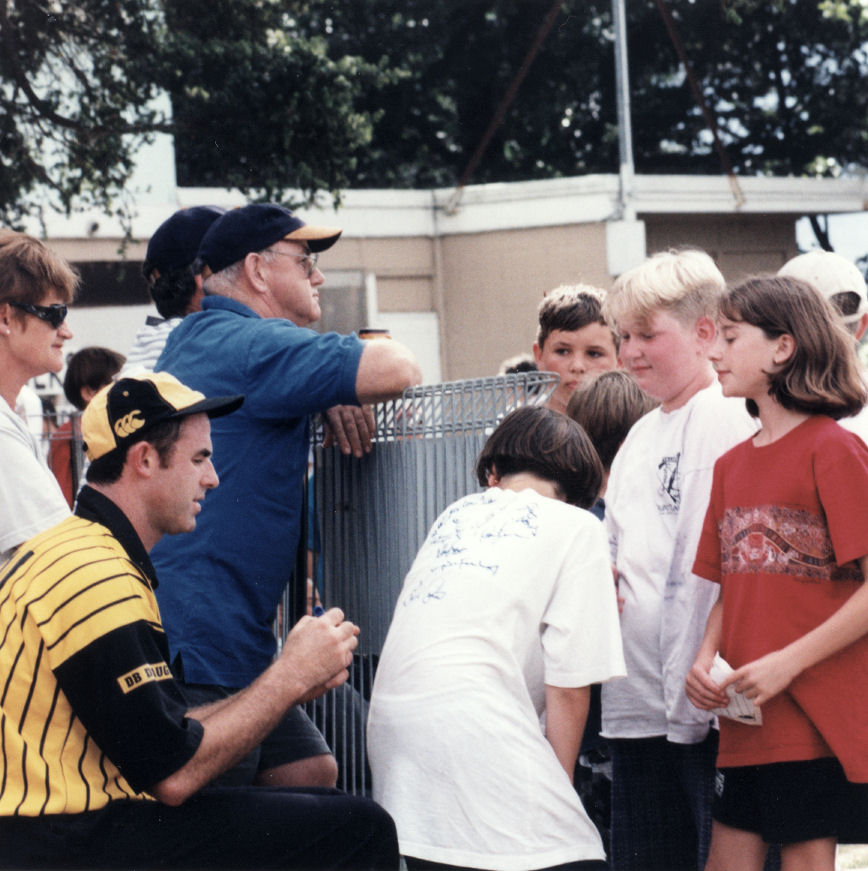 Cricket Max; Wellington Firebirds all-rounder Richard Petrie and autograph hunters.