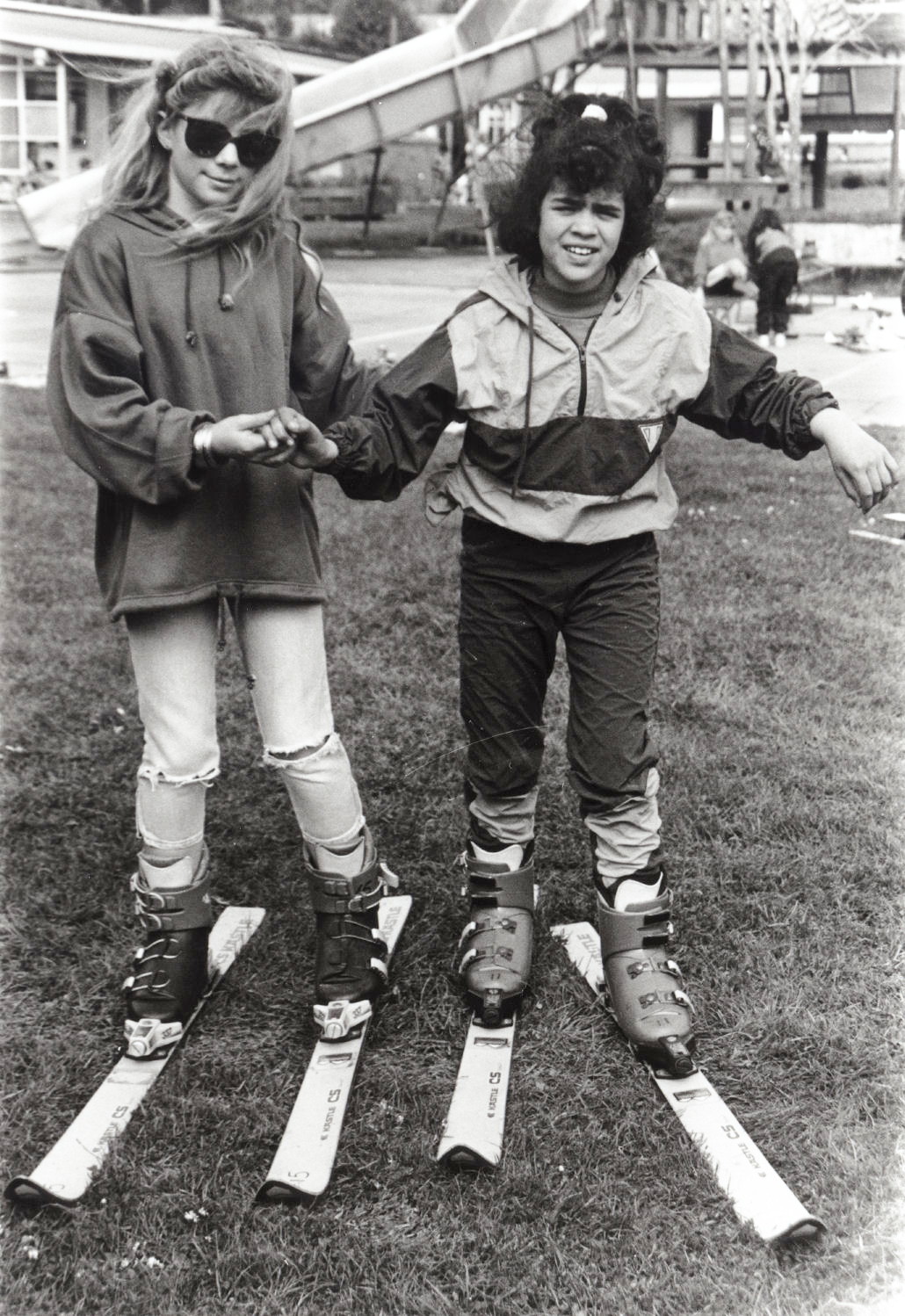 Plateau School; Melissa Sadler, Christina O'Keeffe try out skis before trip to Ruapehu.
