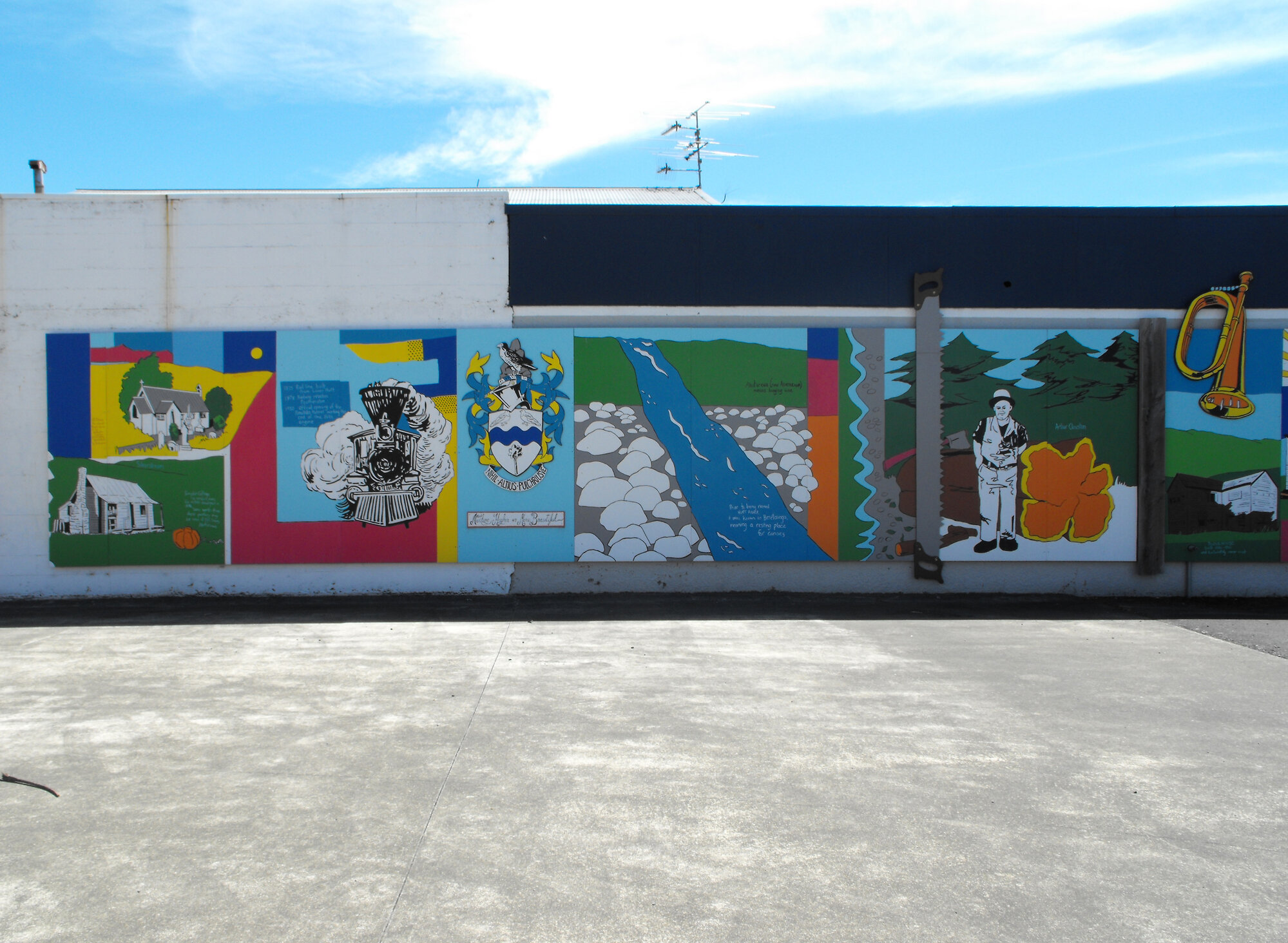 Main Street, south side; No.  48; murals on the east wall 1.