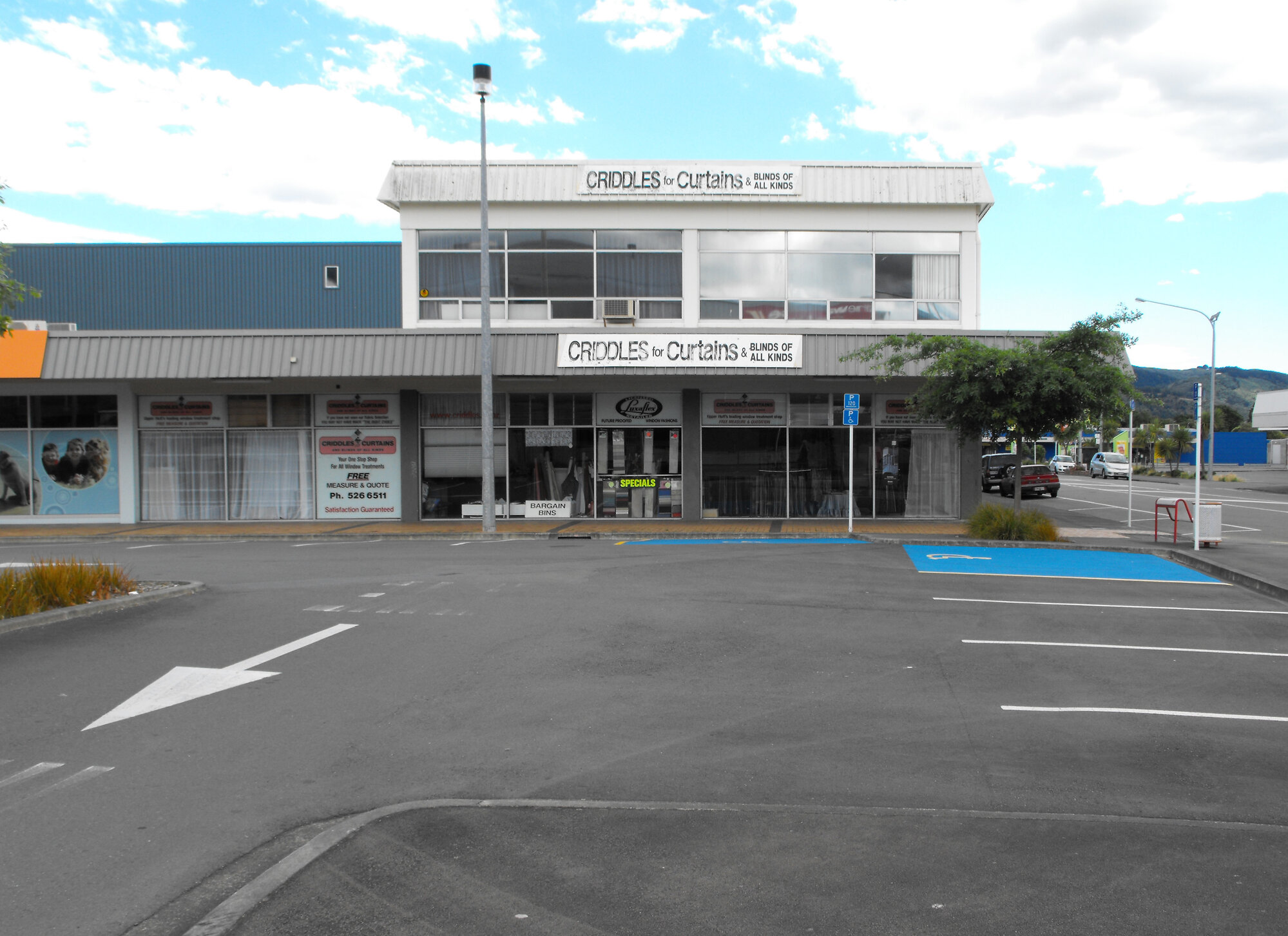 Logan Street west side 4; Criddles for Curtains (76 Queen Street)
